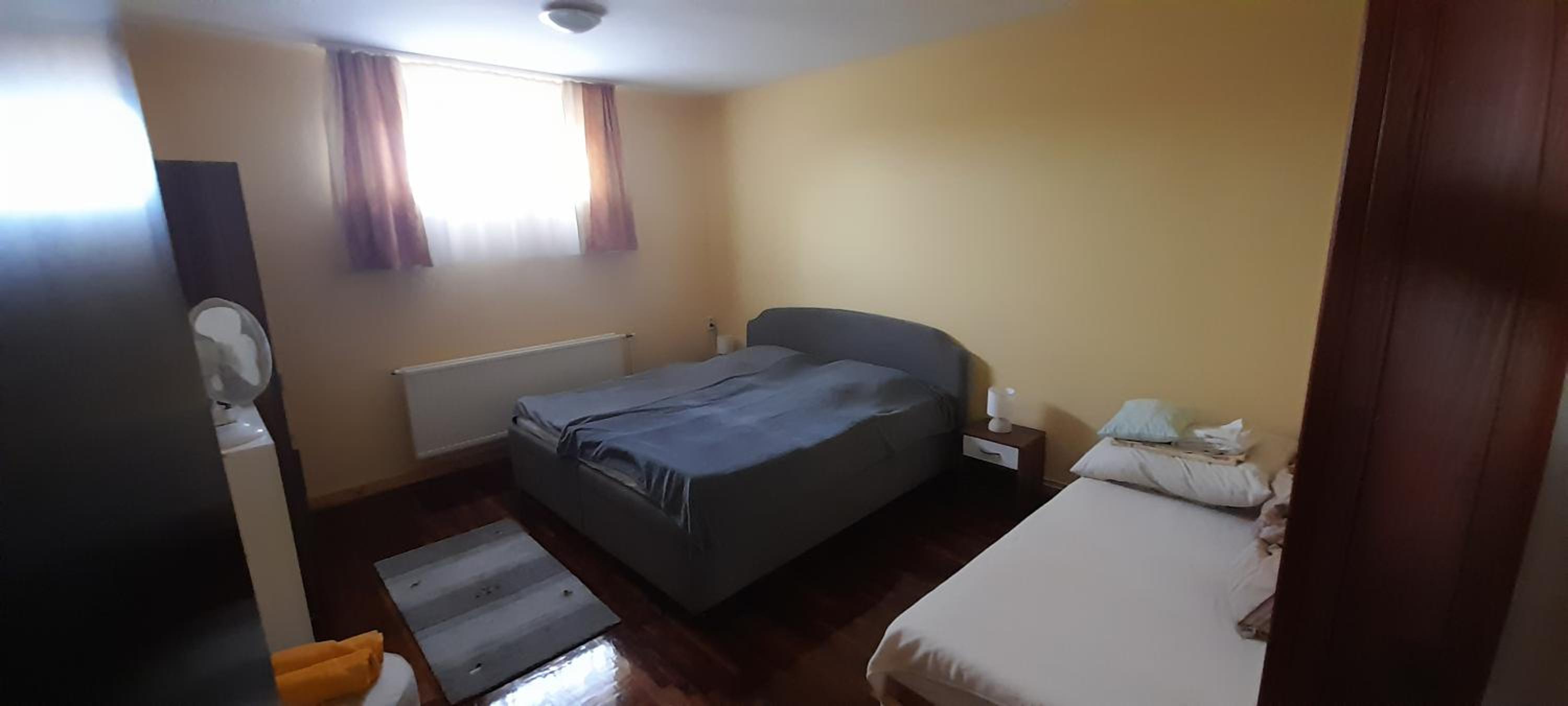 Three-Bedroom Apartment - Photo 19
