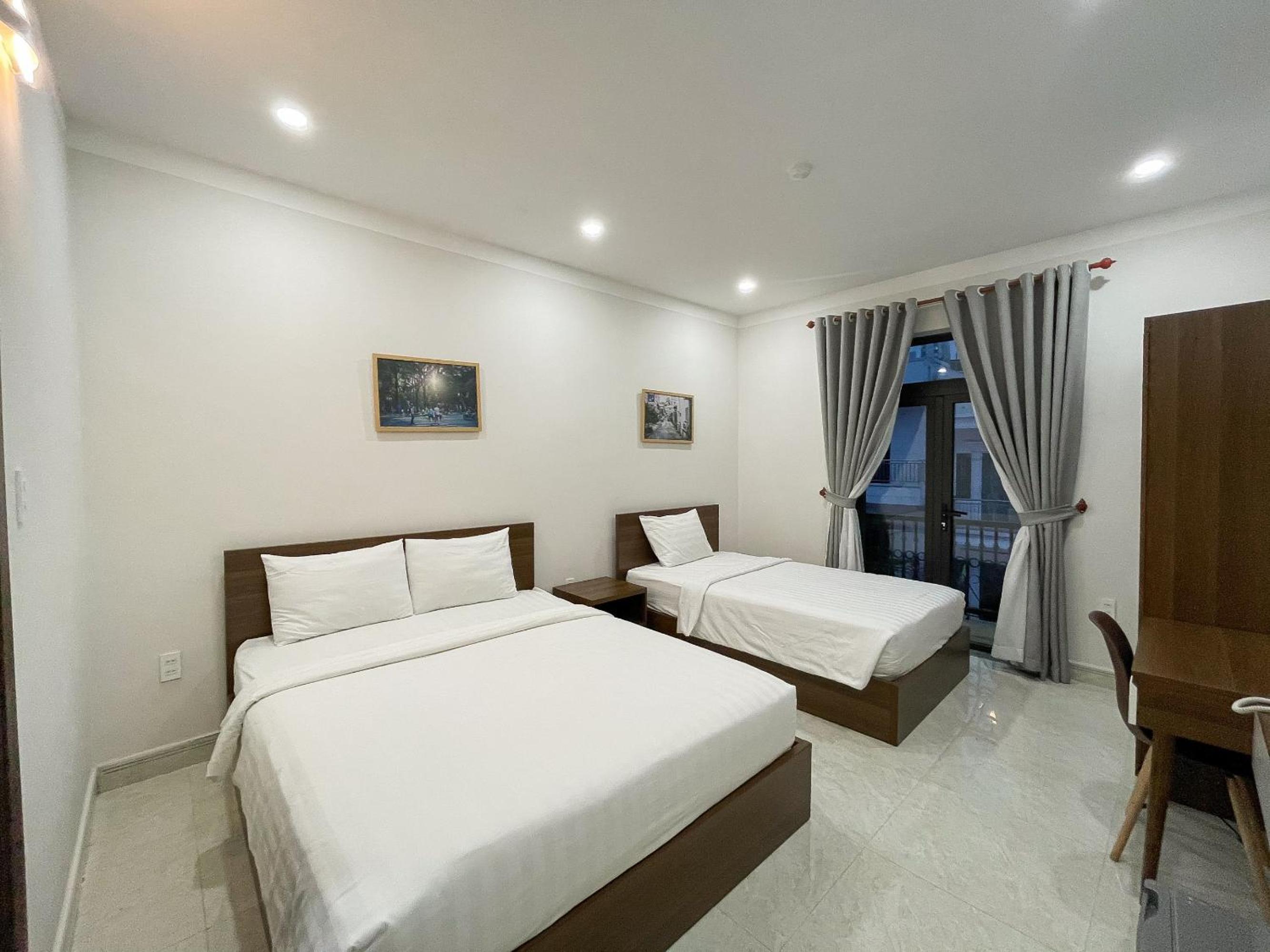 Deluxe Triple Room - Photo 1
