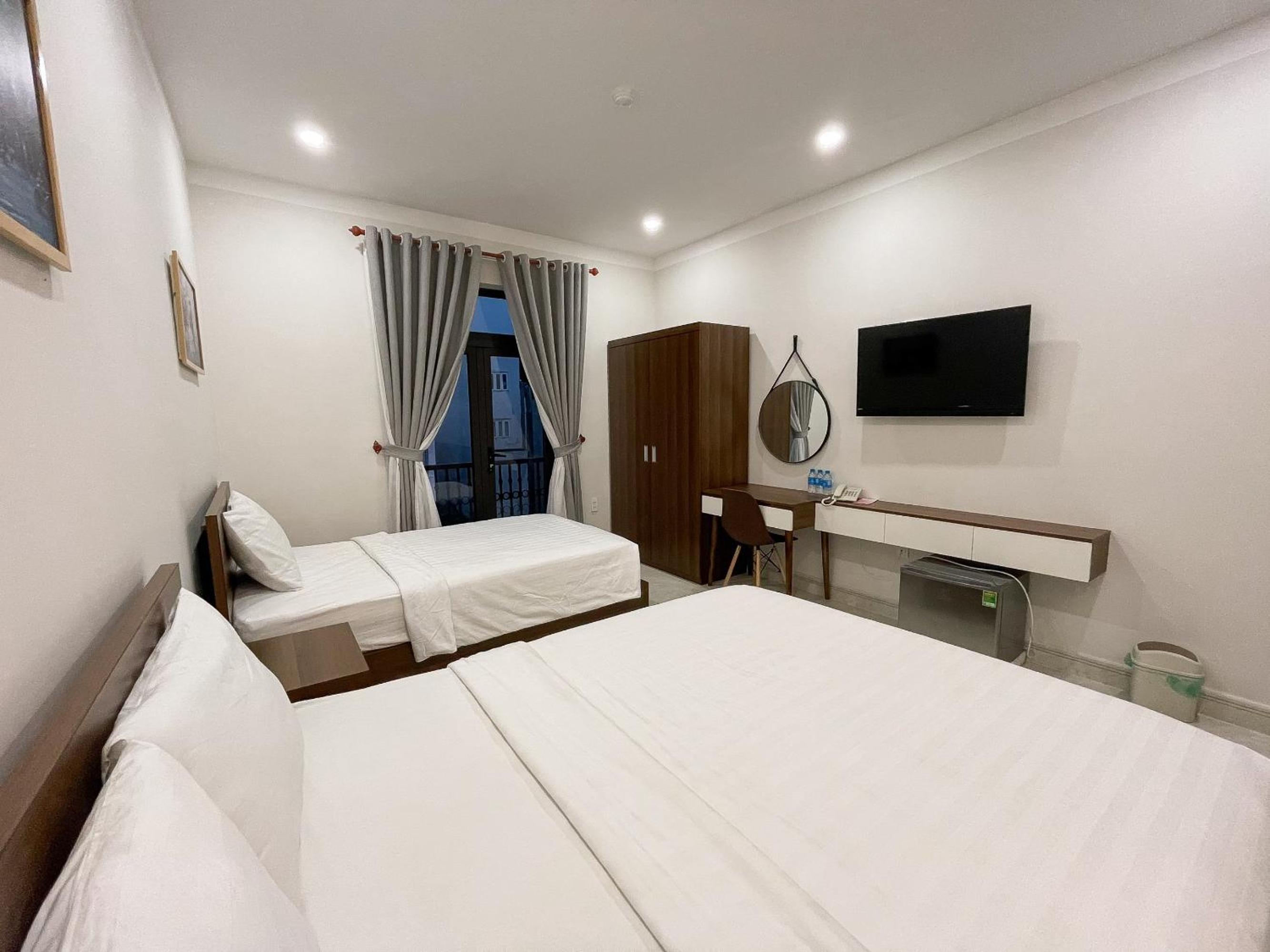 Deluxe Triple Room - Photo 6