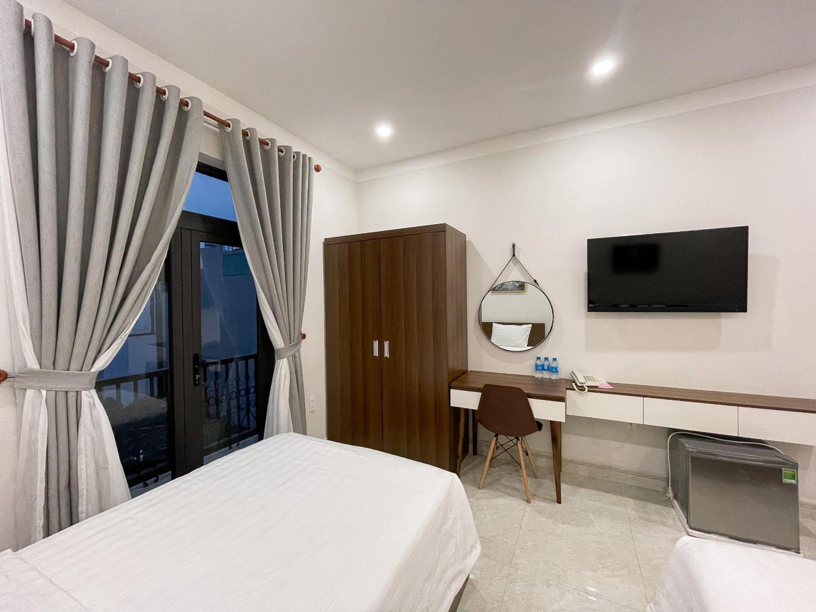 Deluxe Triple Room - Photo 5
