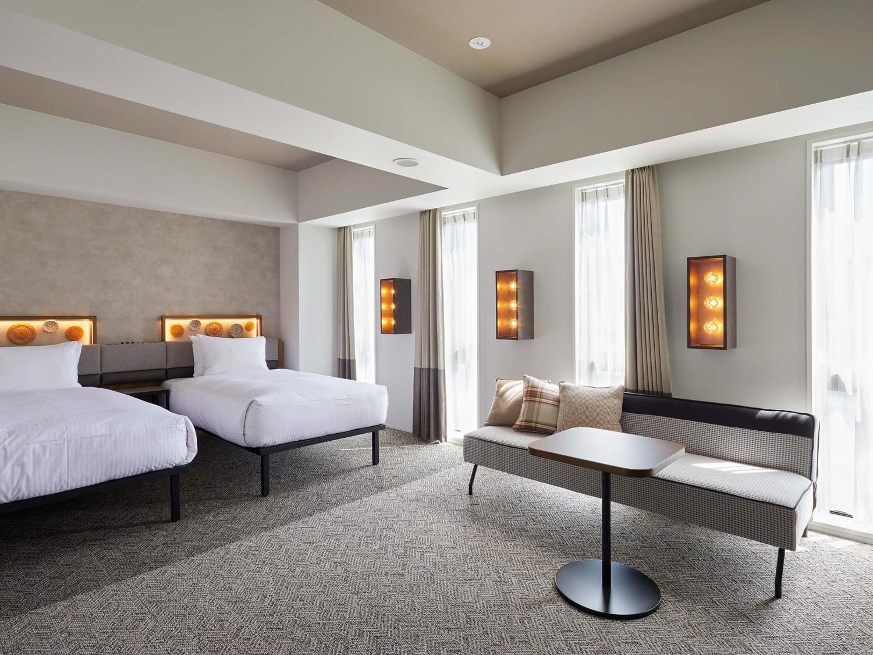 Universal Twin Room - Photo 1