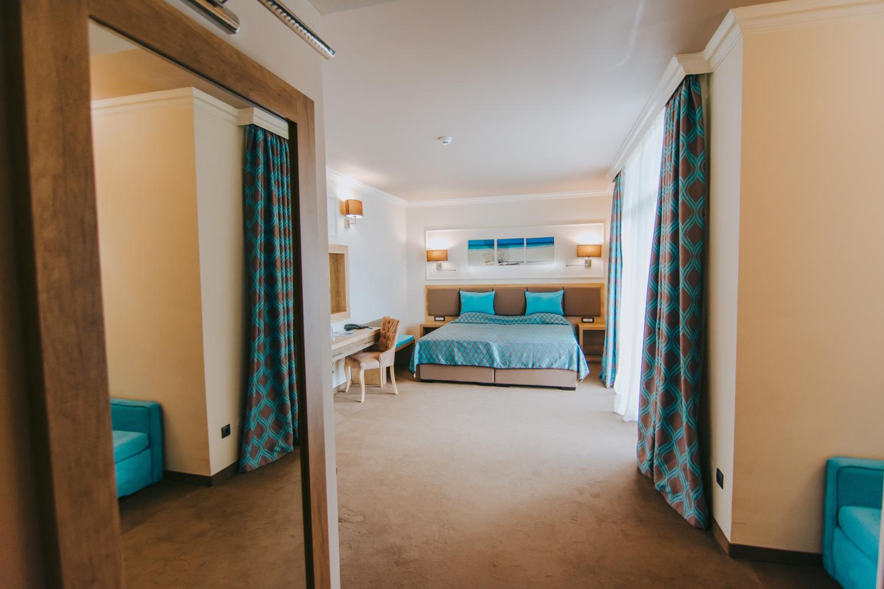 Superior Twin Room with Balcony and Street View (3 Adults + 1 Children)