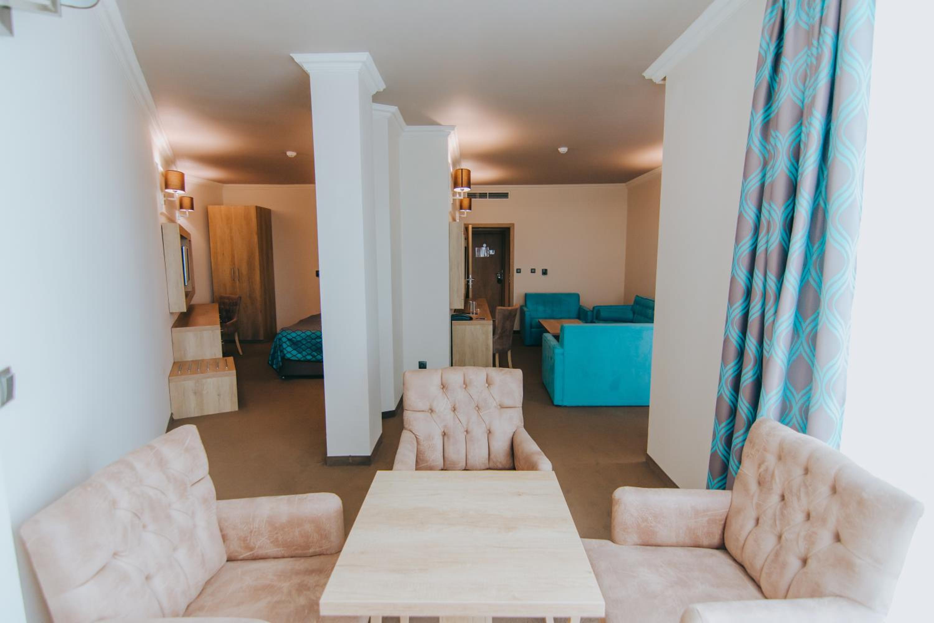 One-Bedroom Suite with Balcony and Sea View (2 Adults + 2 Children)