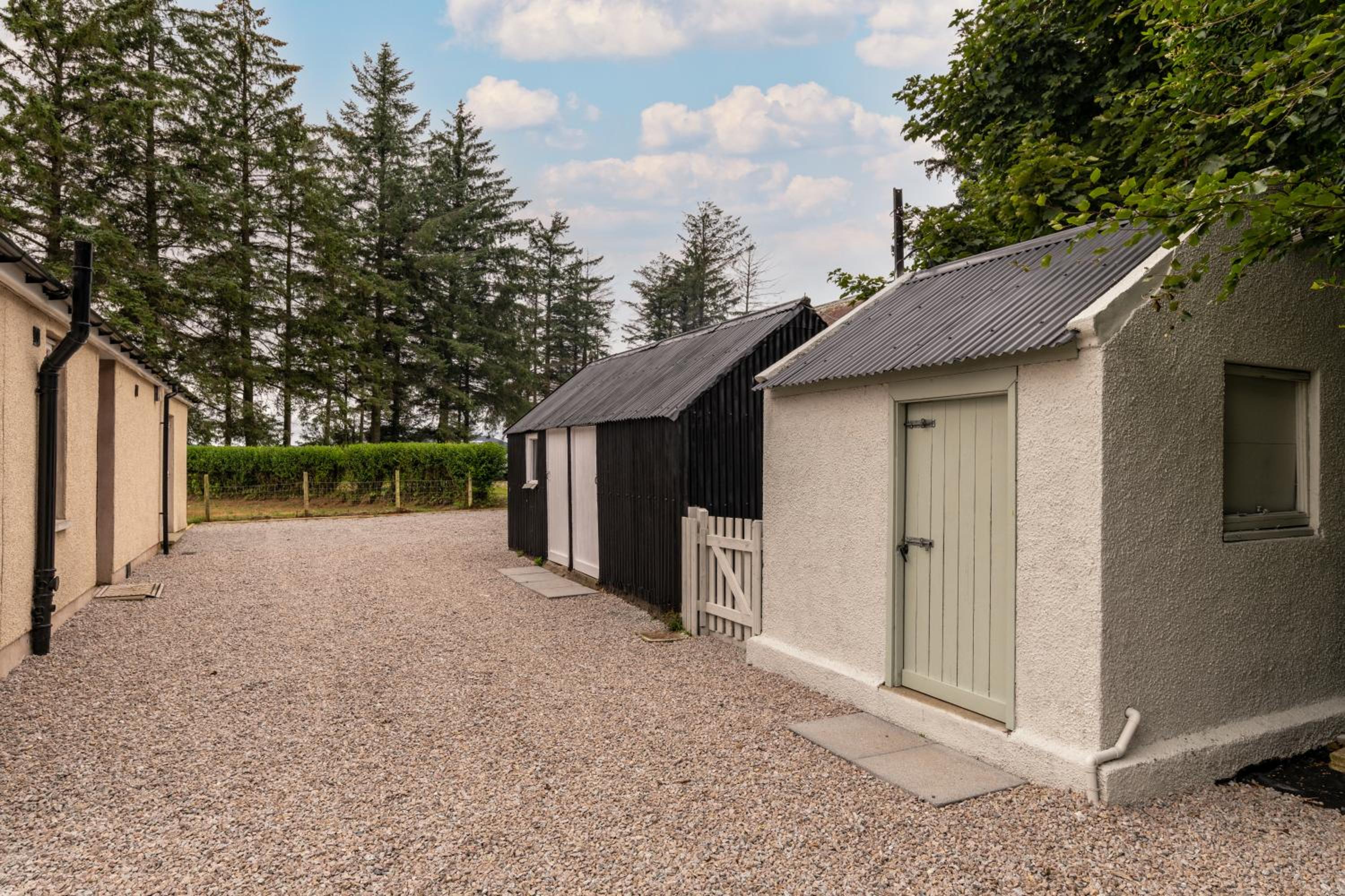 Three-Bedroom House - Photo 35