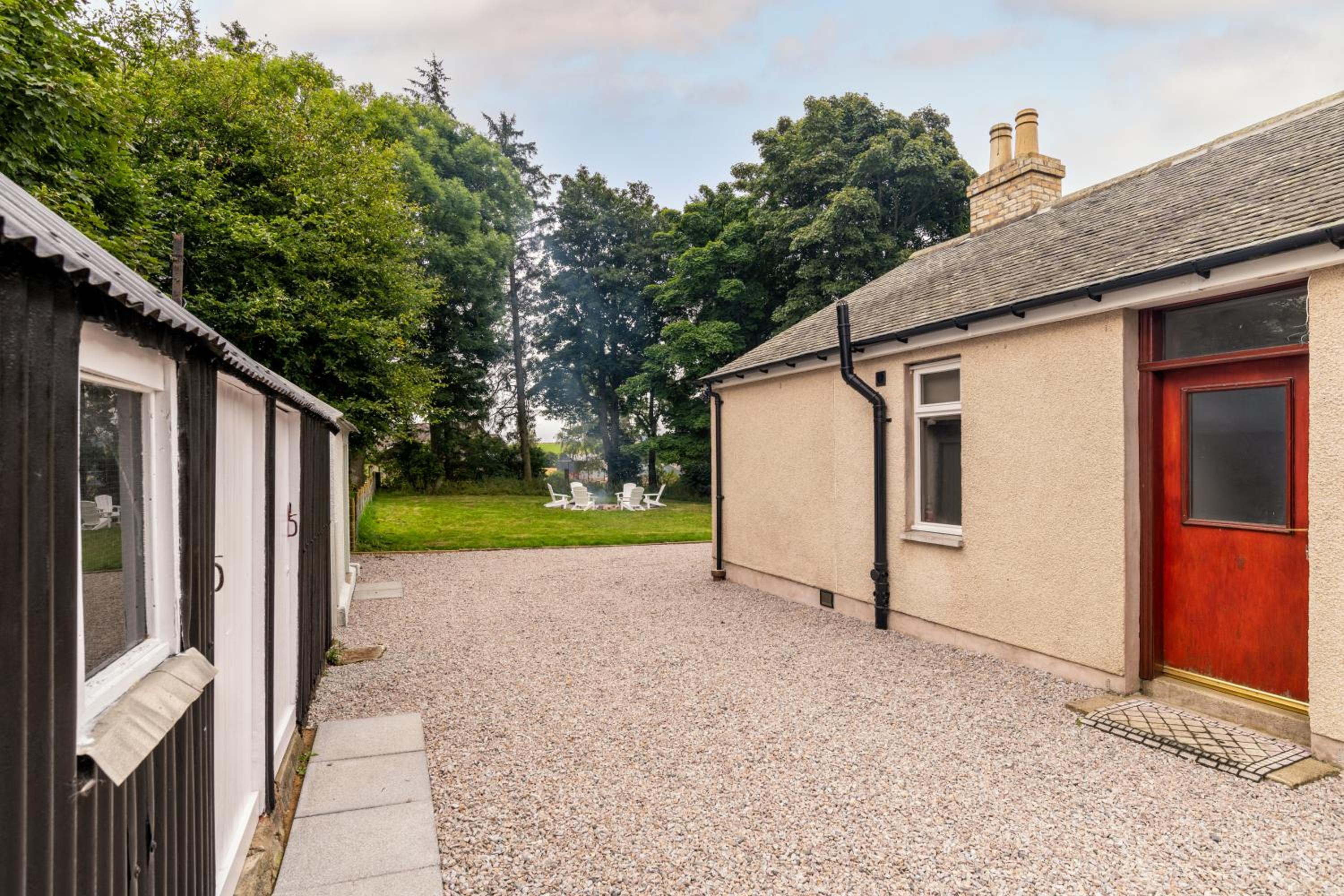 Three-Bedroom House - Photo 42