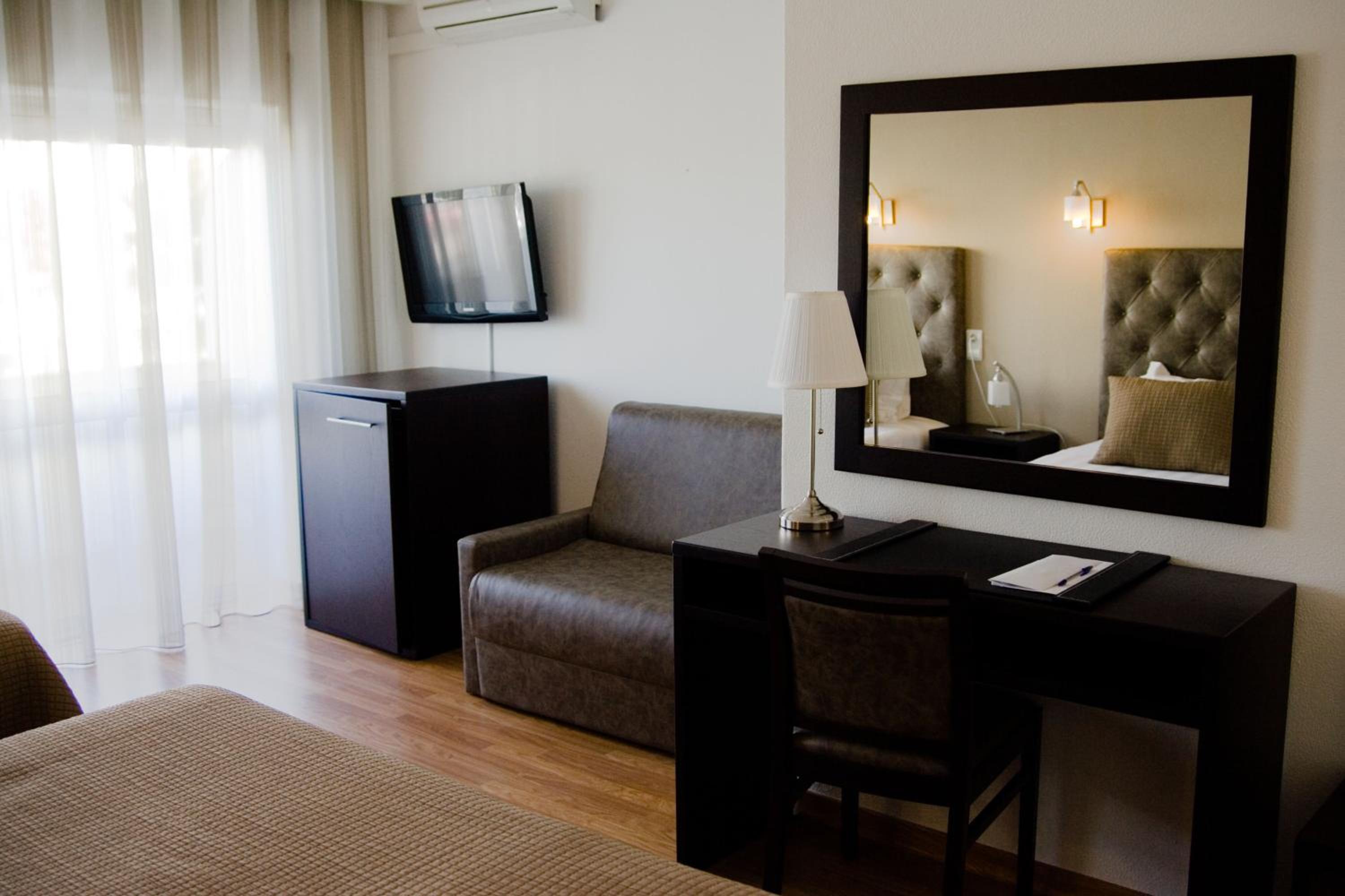 Family Room with Balcony - Photo 1