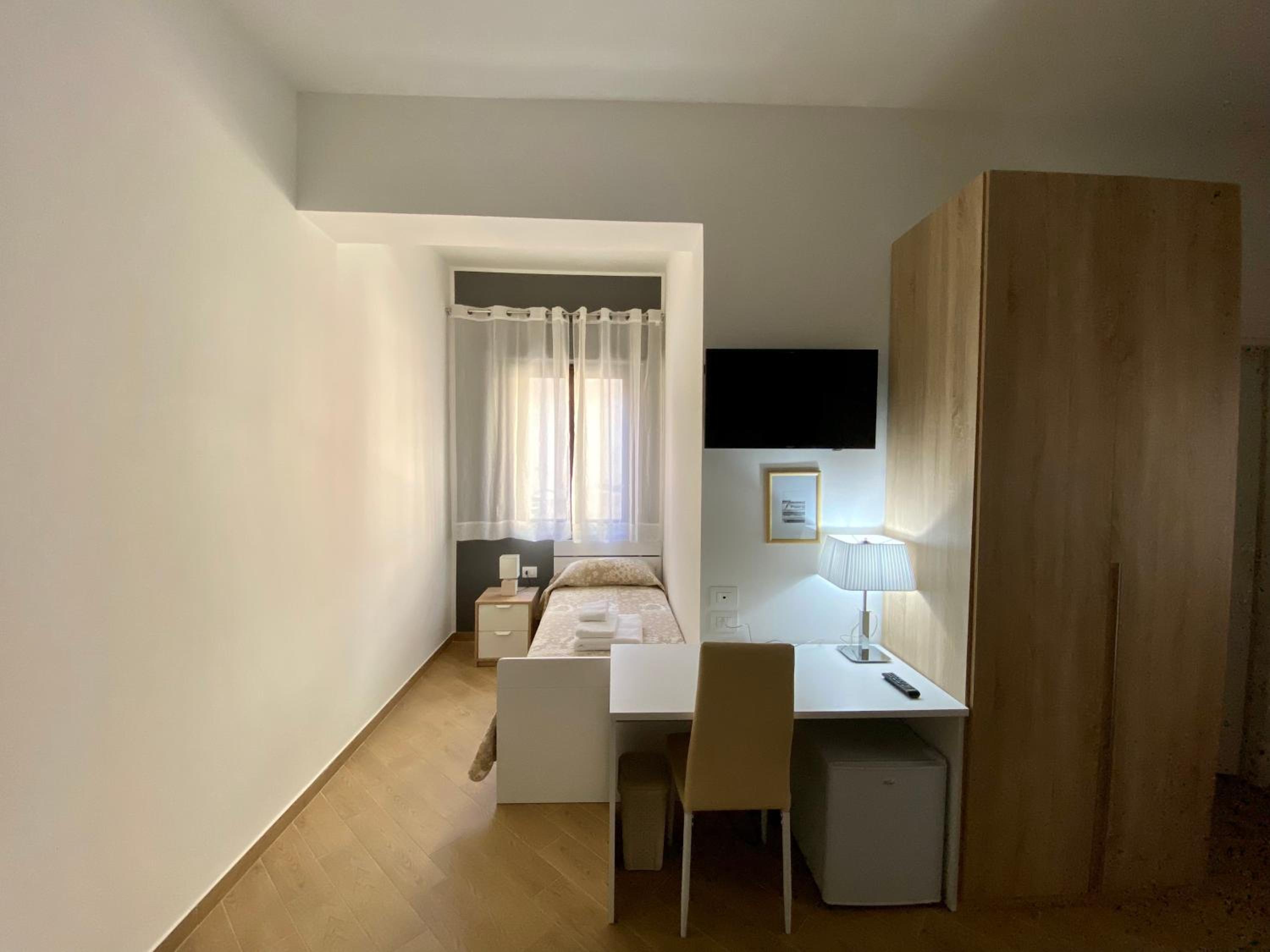 Deluxe Quadruple Room - Photo 5