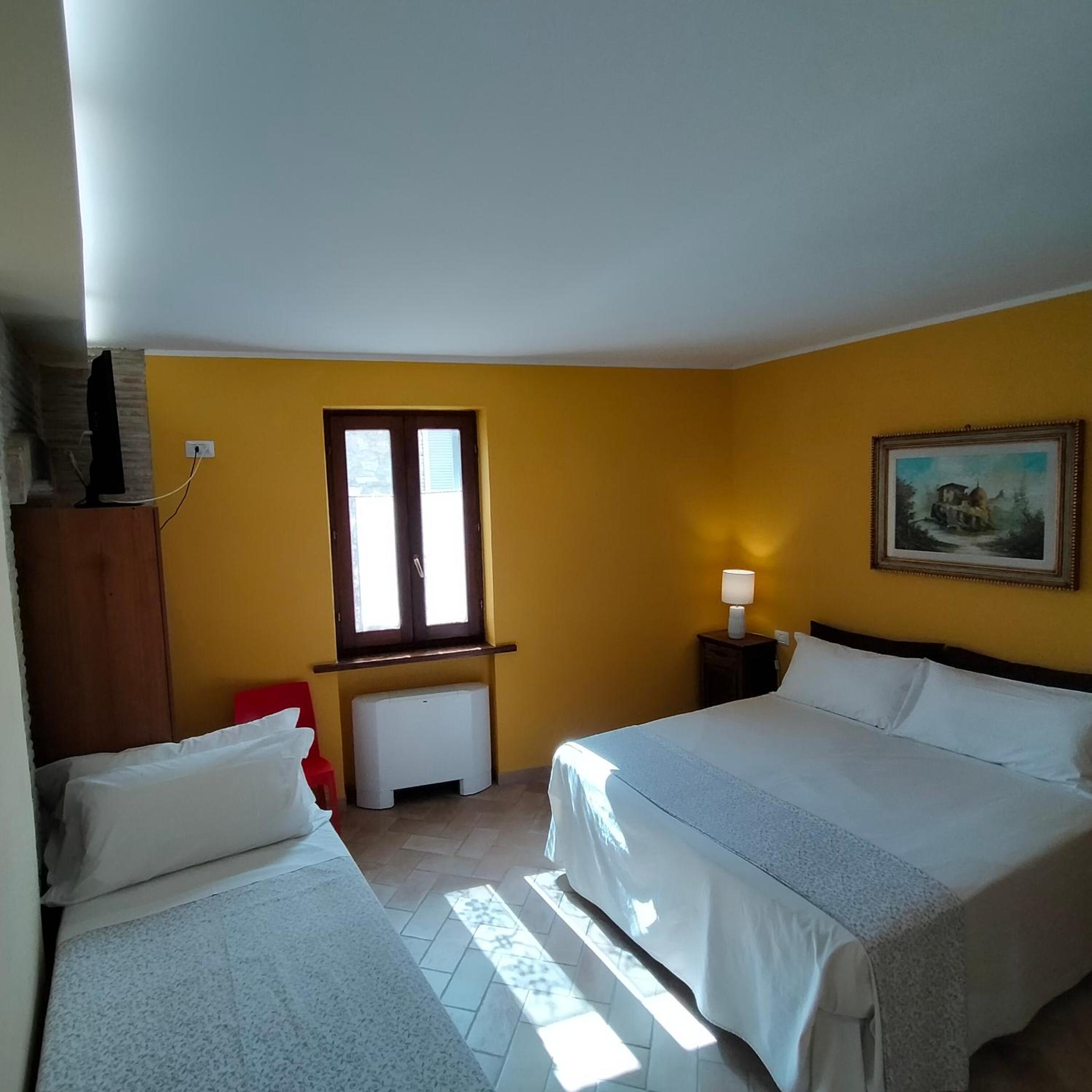Quadruple Room - Photo 12