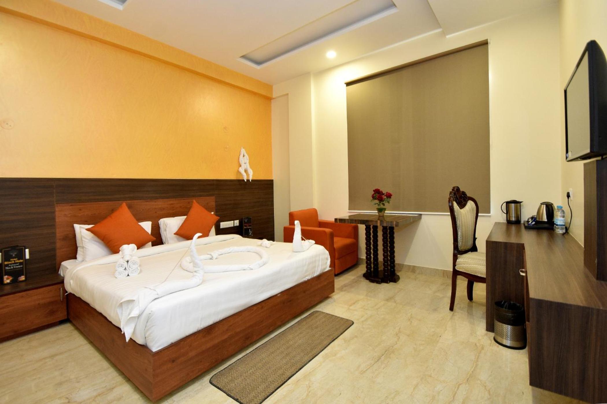Deluxe Room - Photo 1