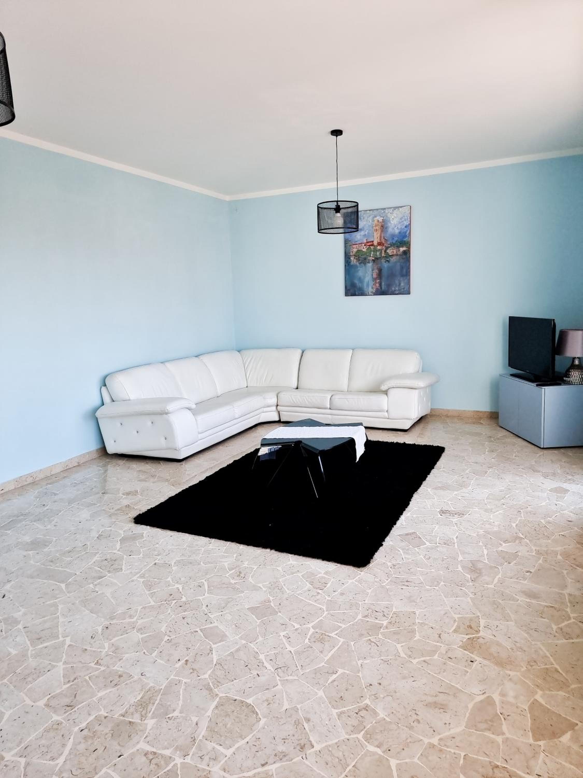 Three-Bedroom Apartment - Photo 2