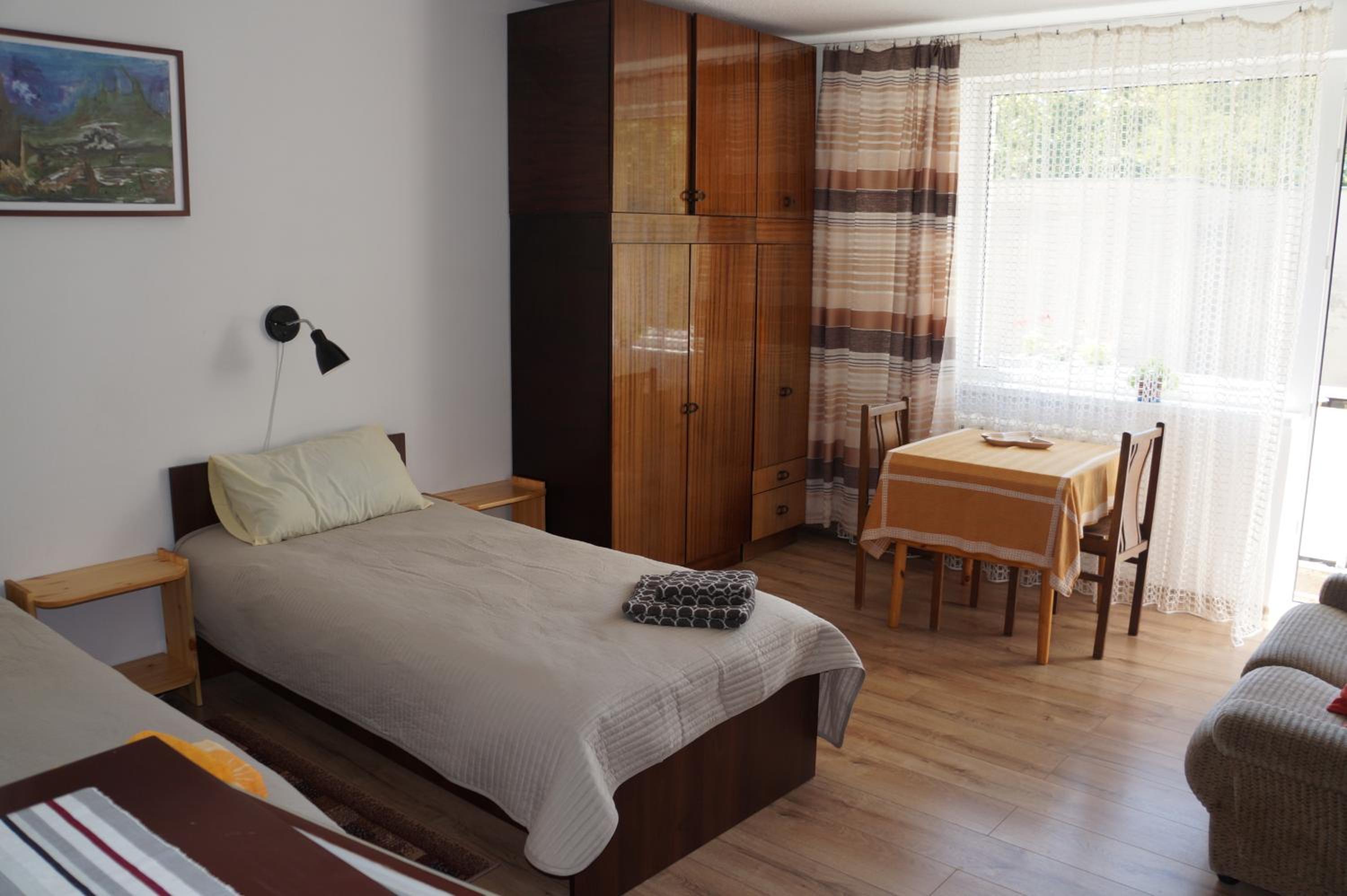 Three-Bedroom Apartment - Photo 4
