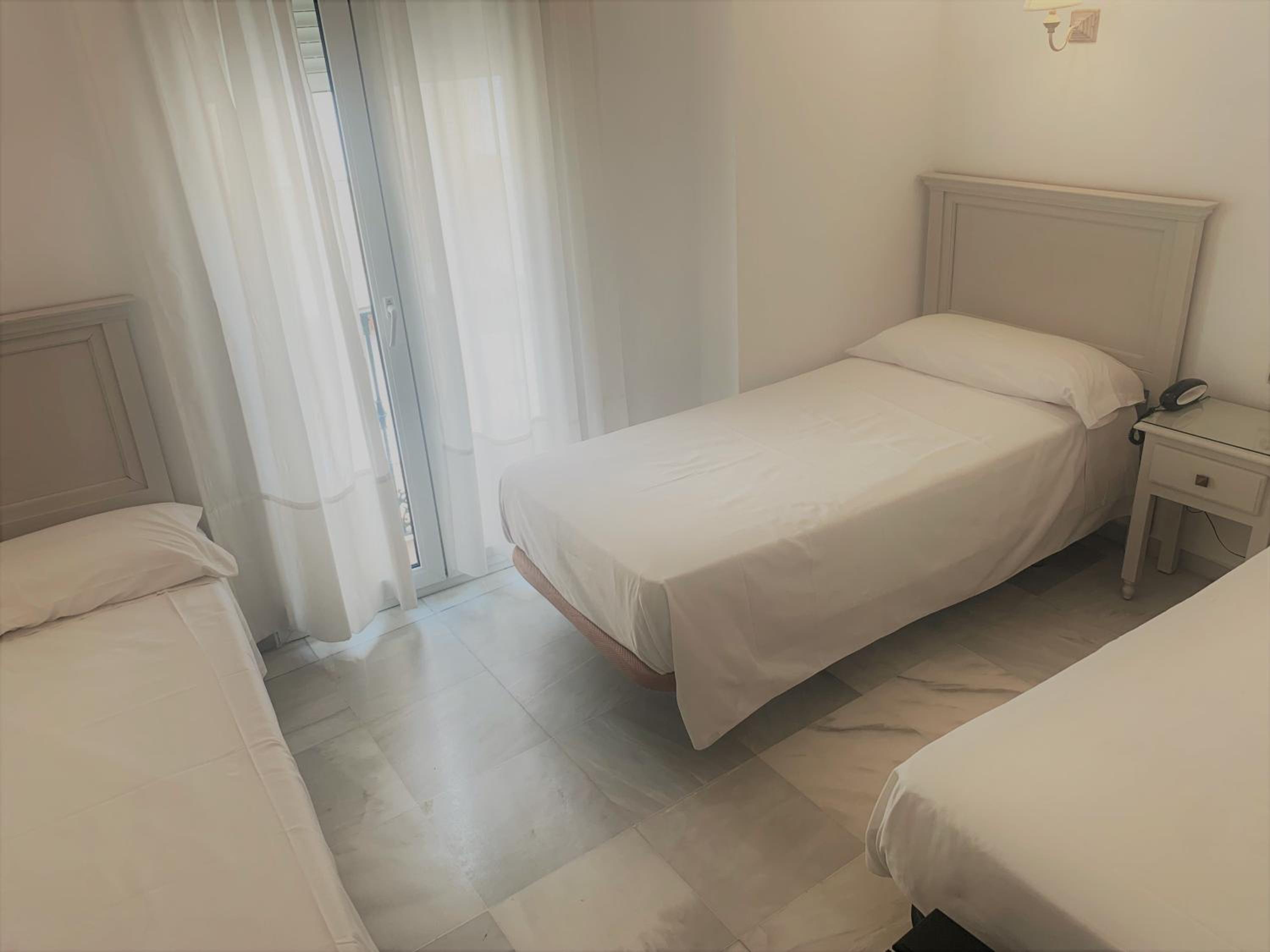 Doble con cama extra - 3 camas individuales