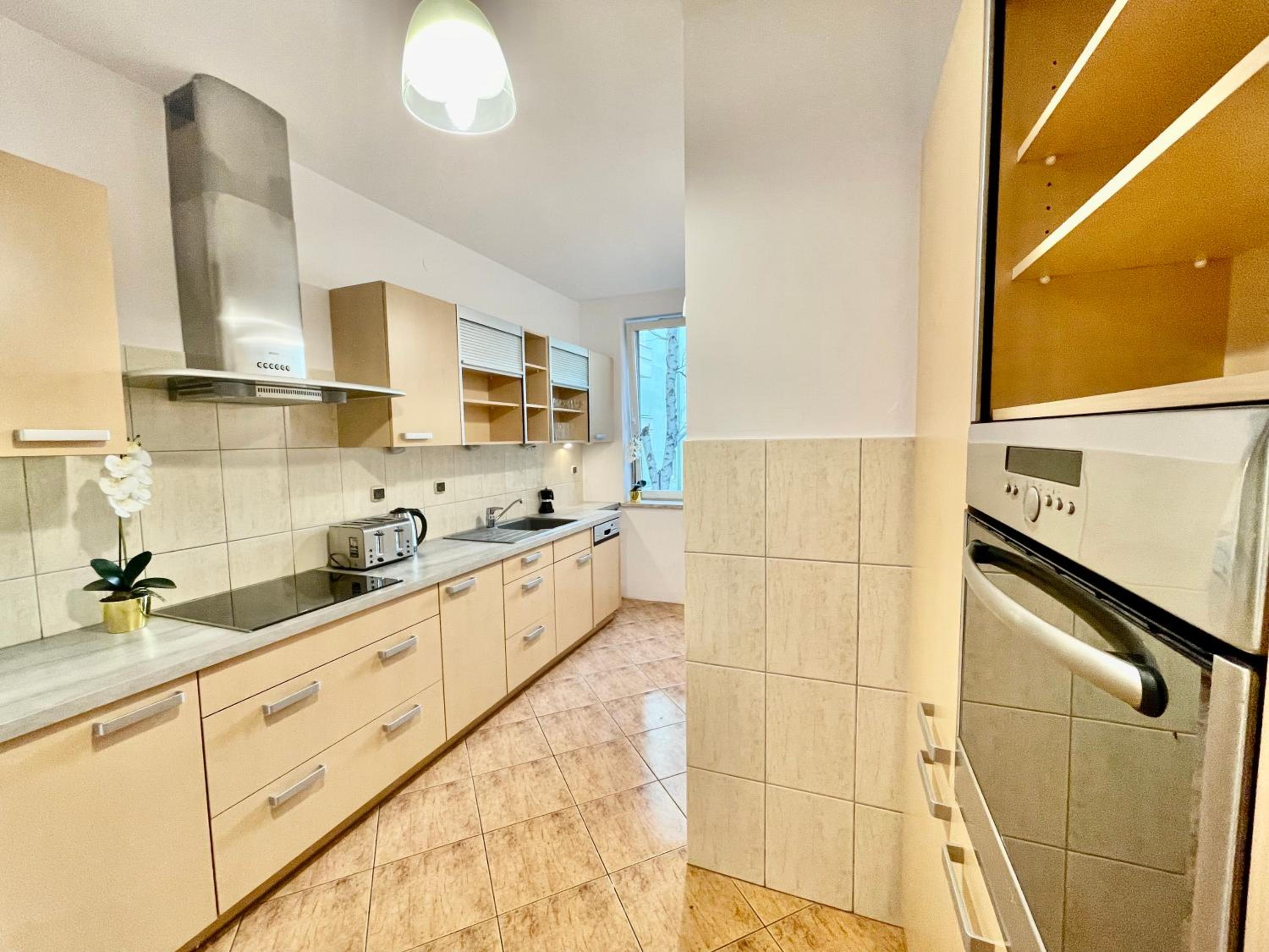 Three-Bedroom Apartment - Photo 8