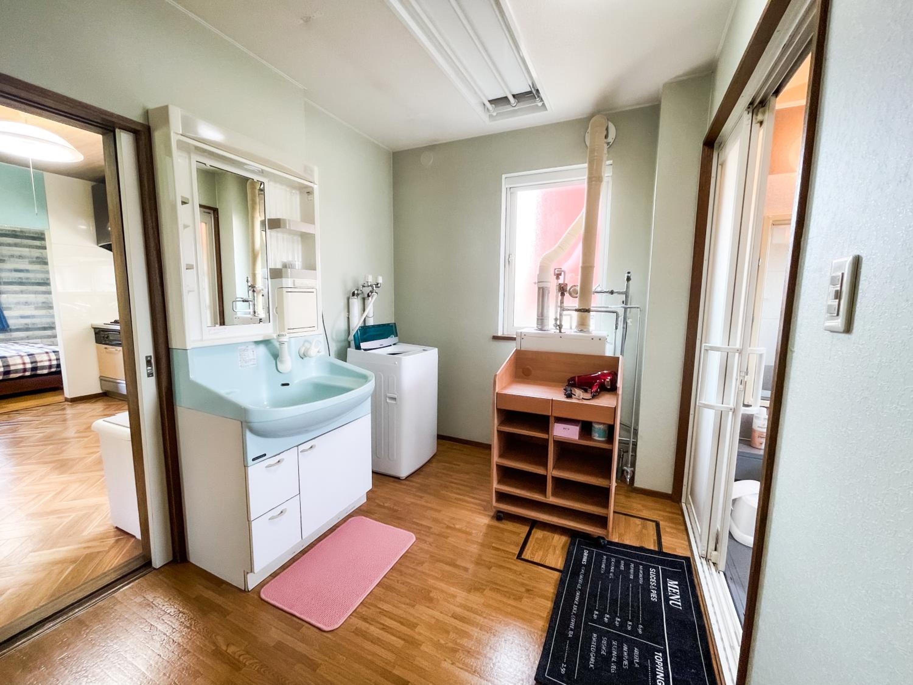 Four-Bedroom House - Photo 26