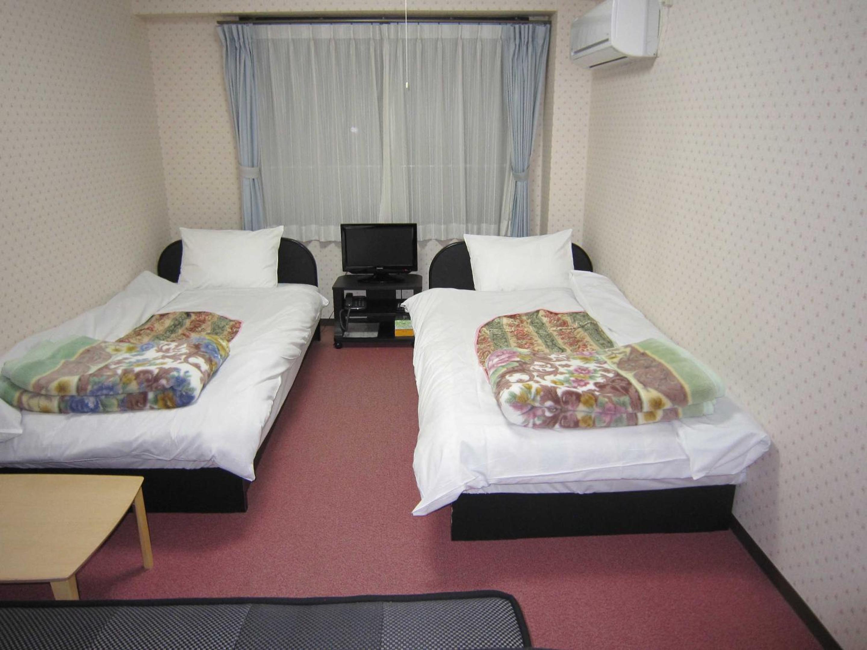 Triple Room with Private Bathroom photo 2