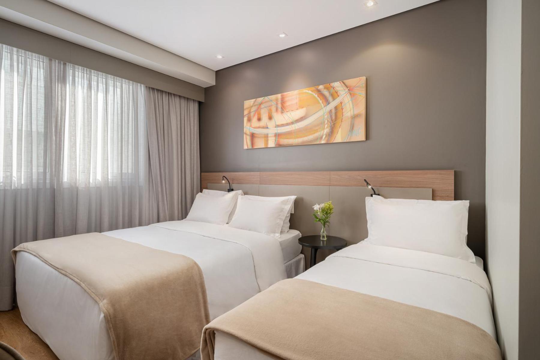 Luxo Triplo - 1 Cama Queen e 1 Cama Solteiro photo 1