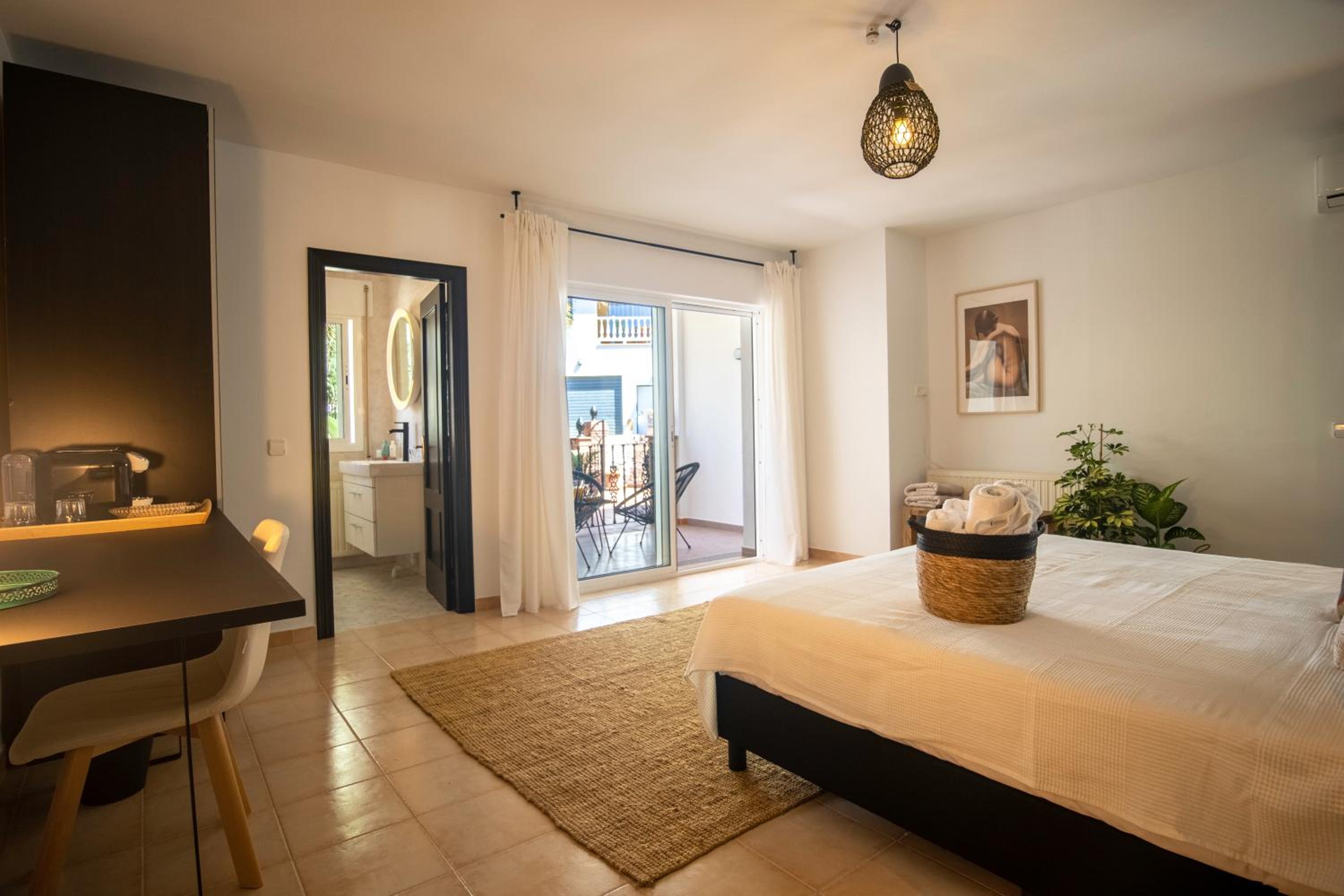 Habitación King con Balcón