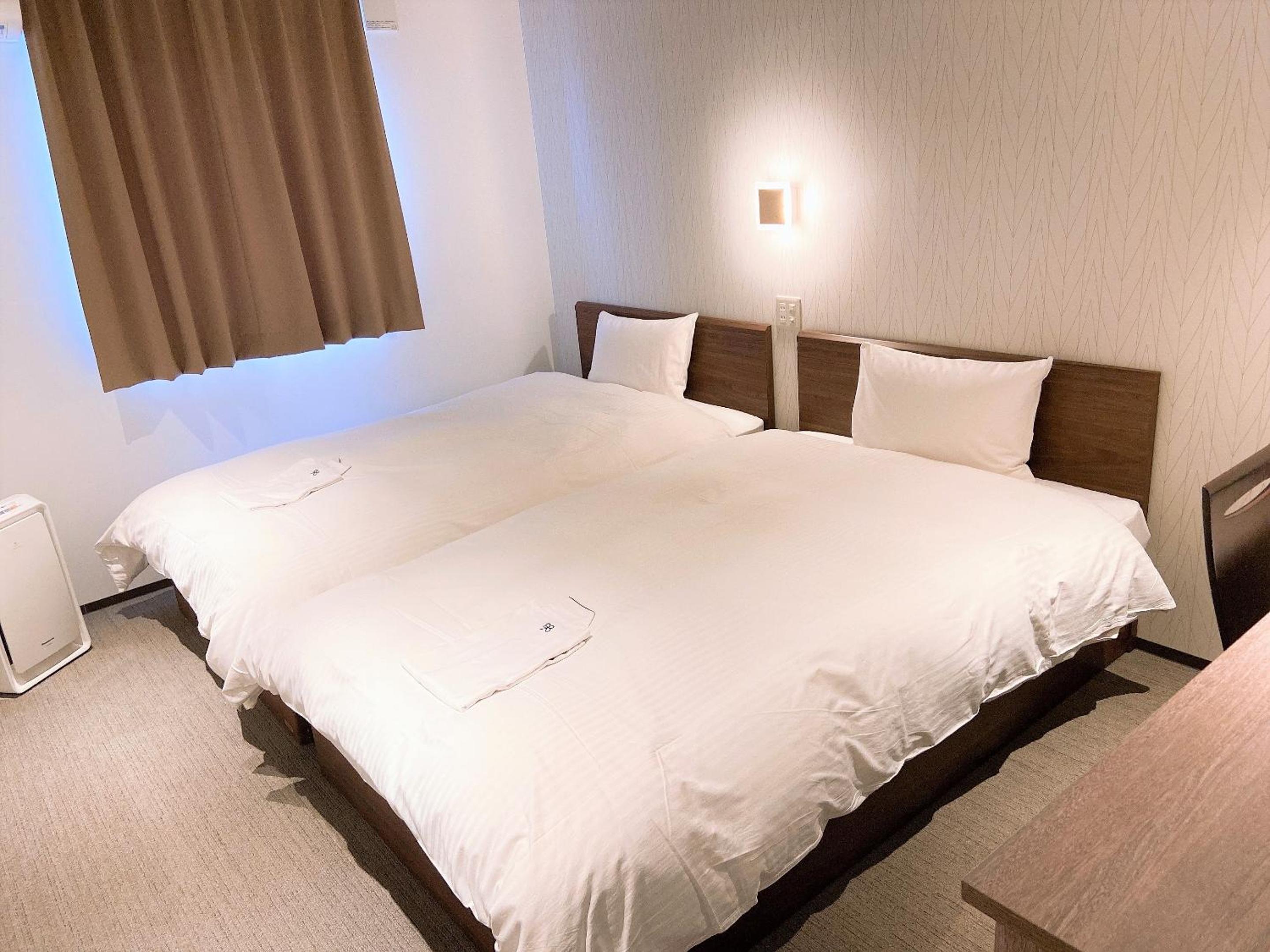 Twin Room - Photo 3