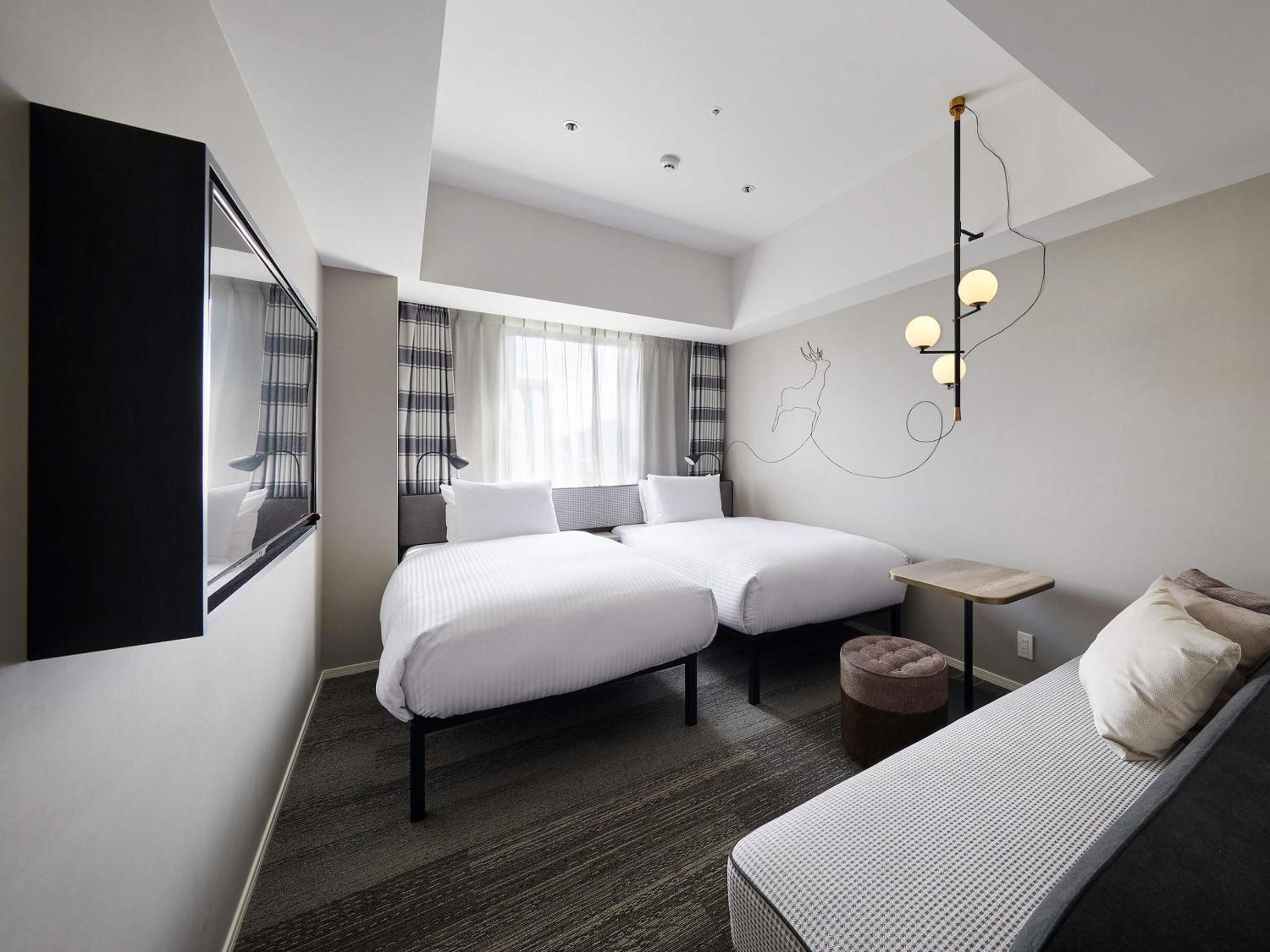 Deluxe Twin Room - Photo 1