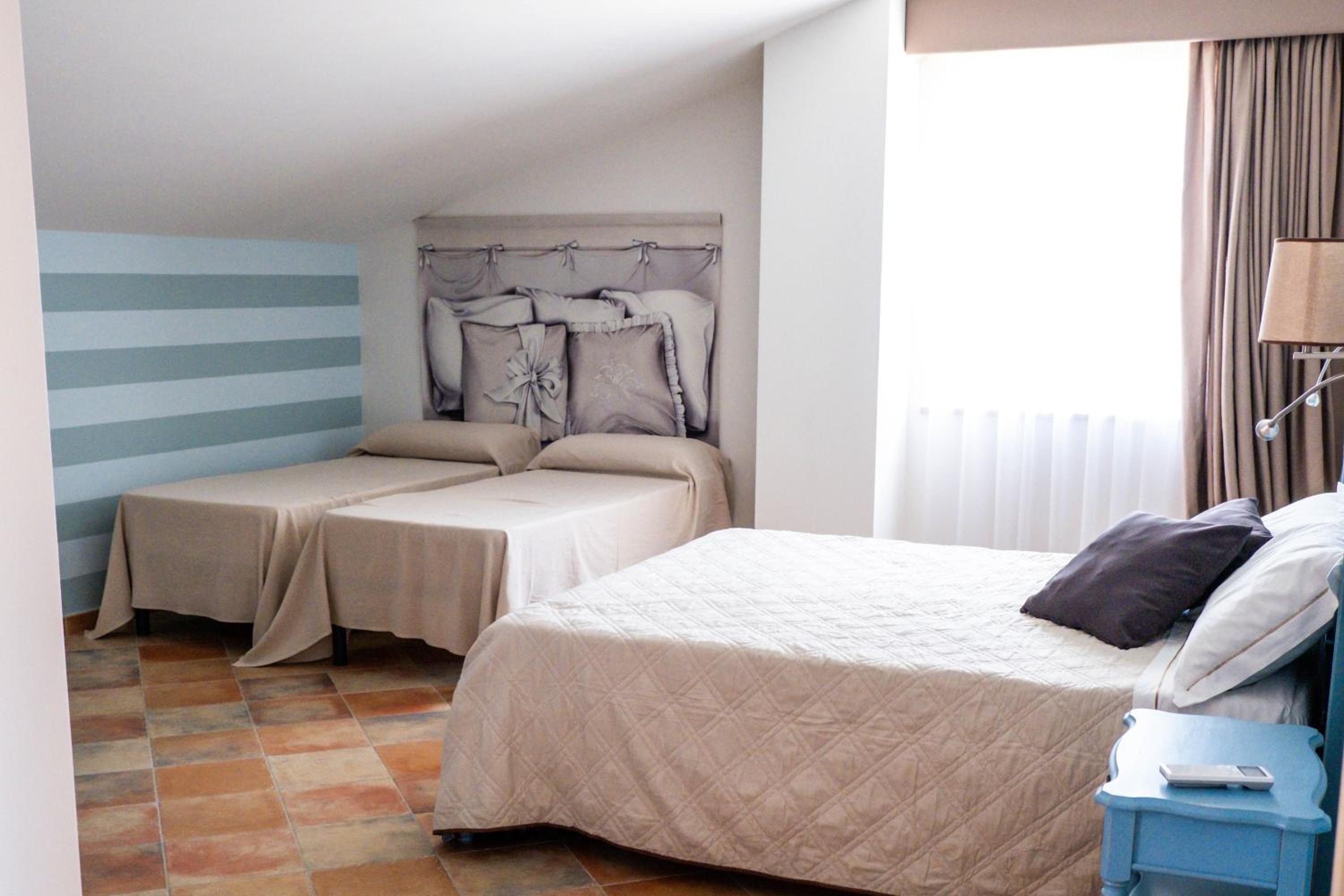 Quadruple Room - Photo 1