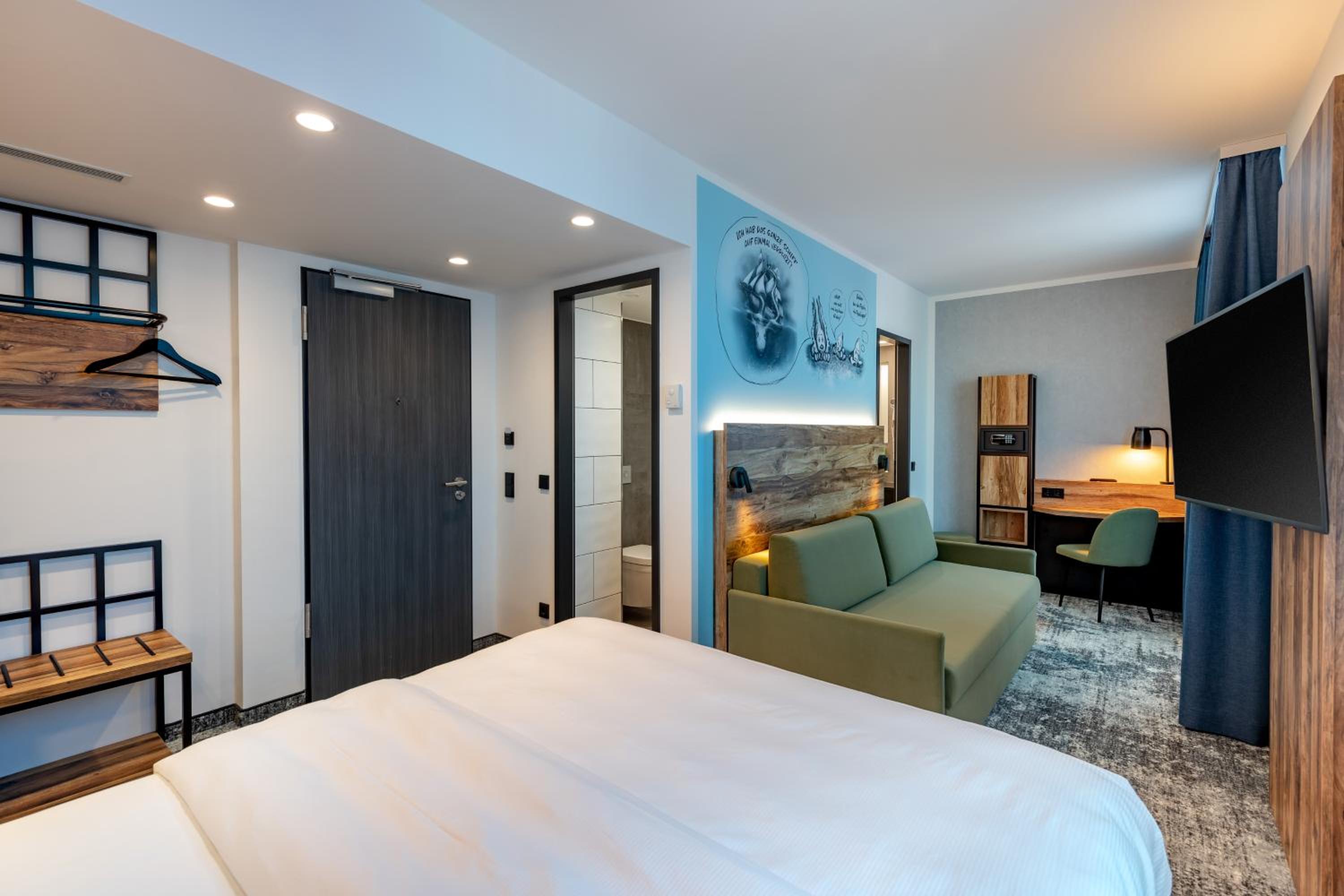 Modern Family Room with One Double Bed and One Sofa - Photo 2