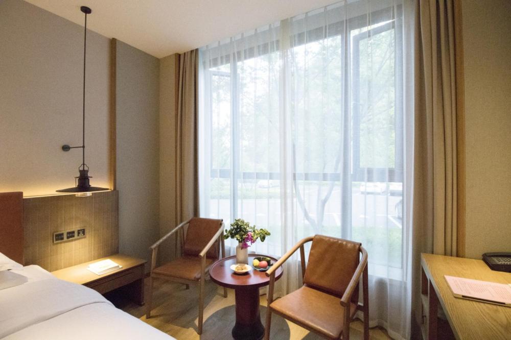 Standard Twin Room - Photo 4