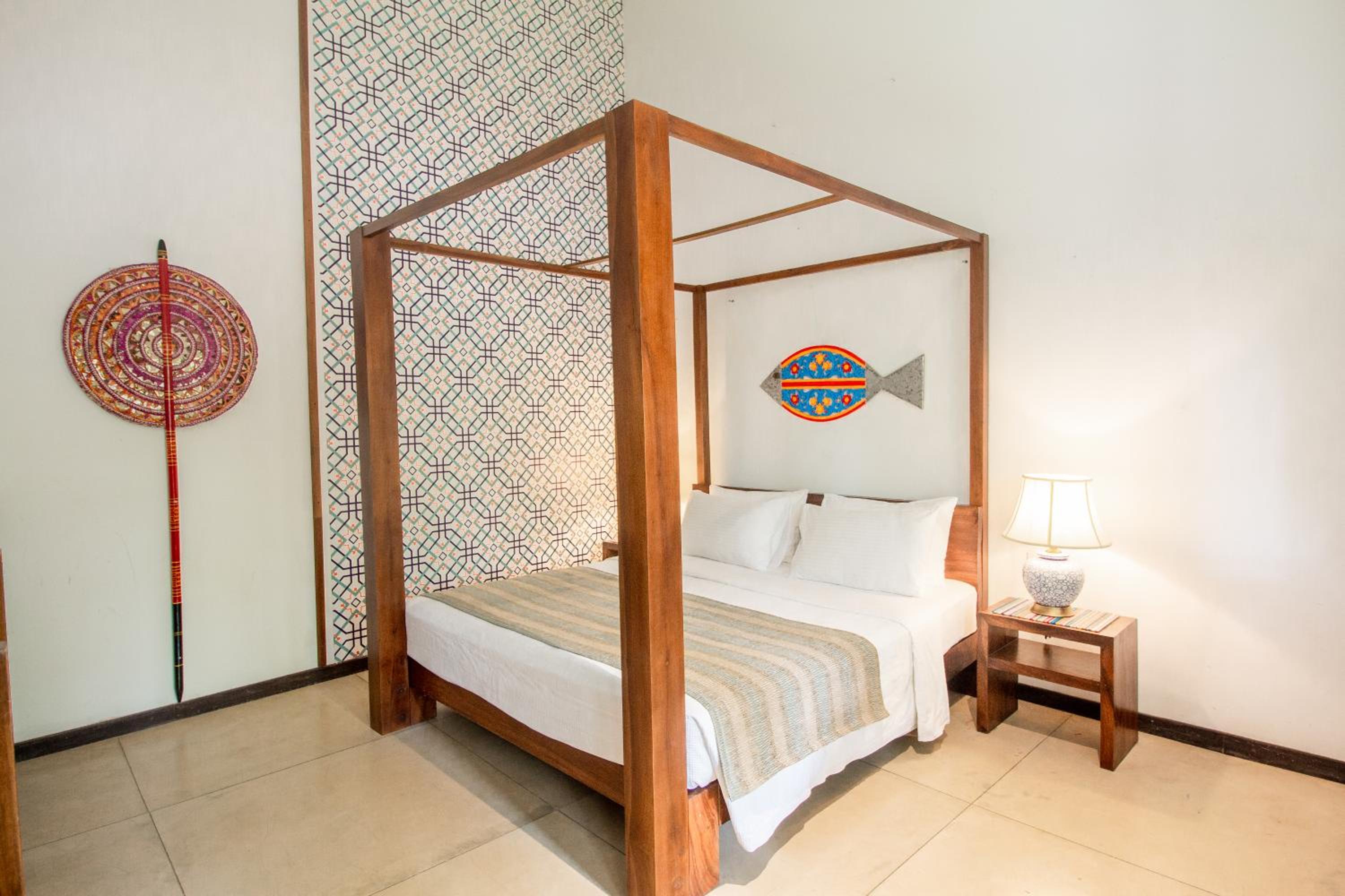 Deluxe Double (Garden View) with refreshing mocktails, beachfront dining, evening tea with snacks at Café Surf, and homemade ice cream