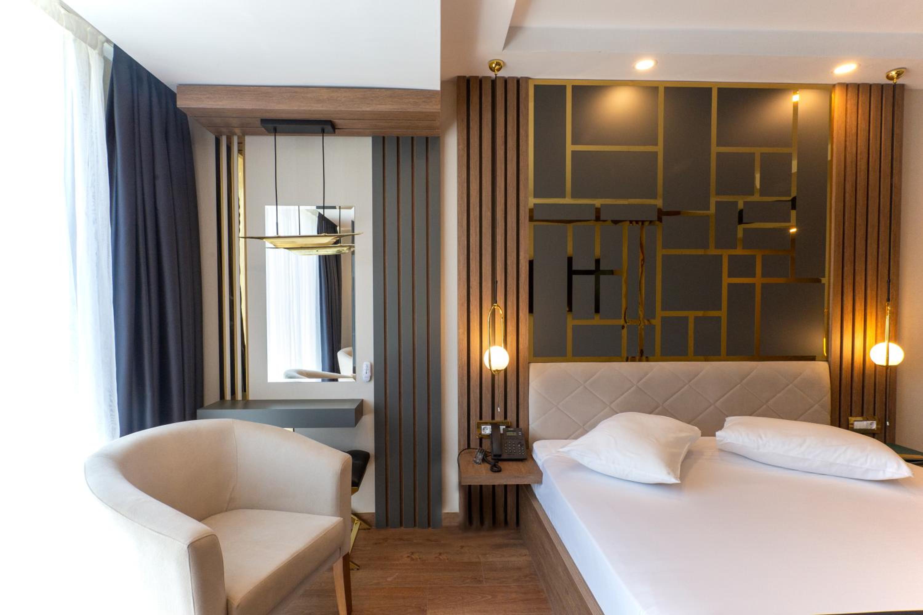 Junior Suite with Balcony Garden View
