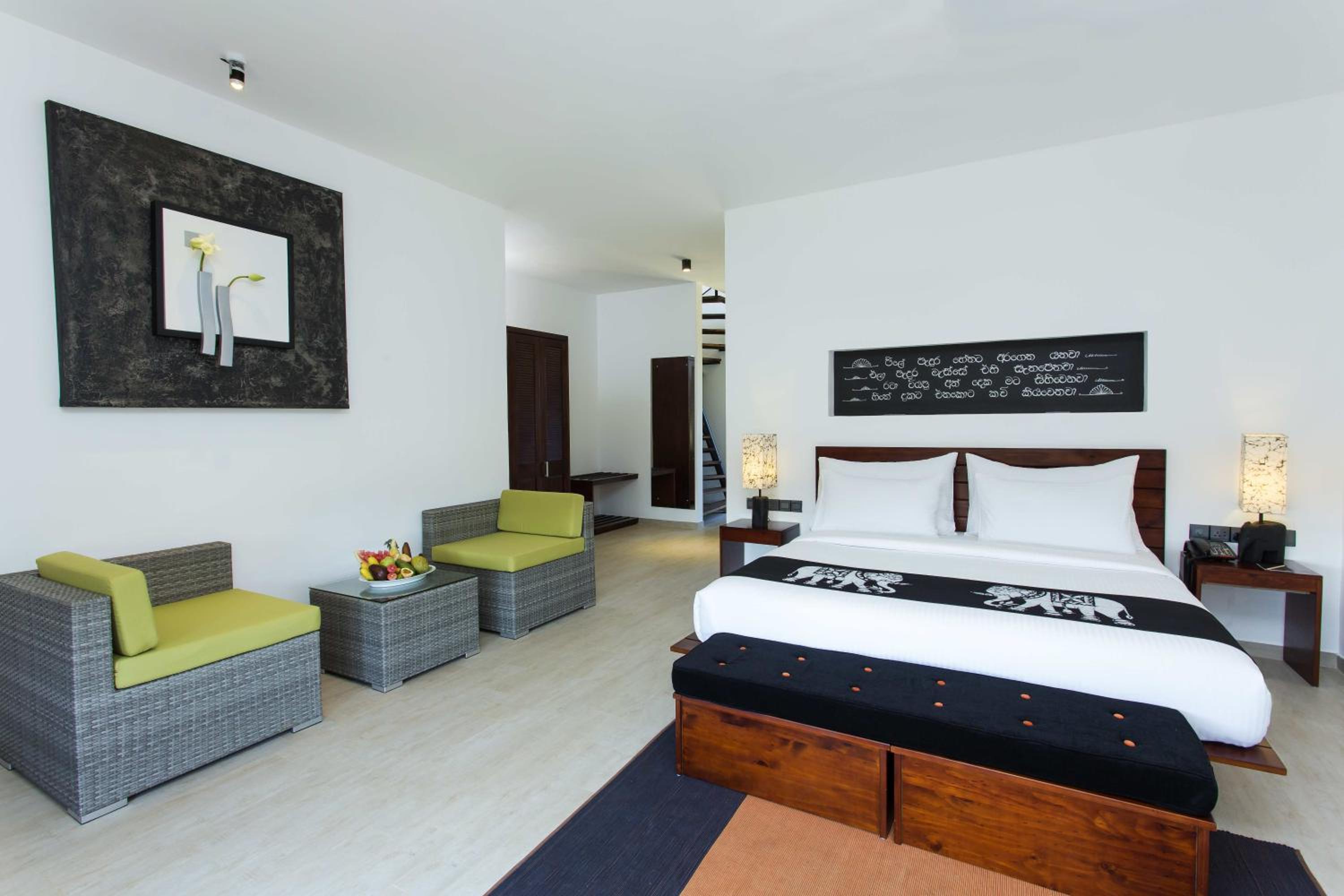 Deluxe Attic Family Room Including cup of tea/coffee overlooking Sigiriya and Pidurangala Rock, a hands-on pottery making experience with paper recycling factory tour.