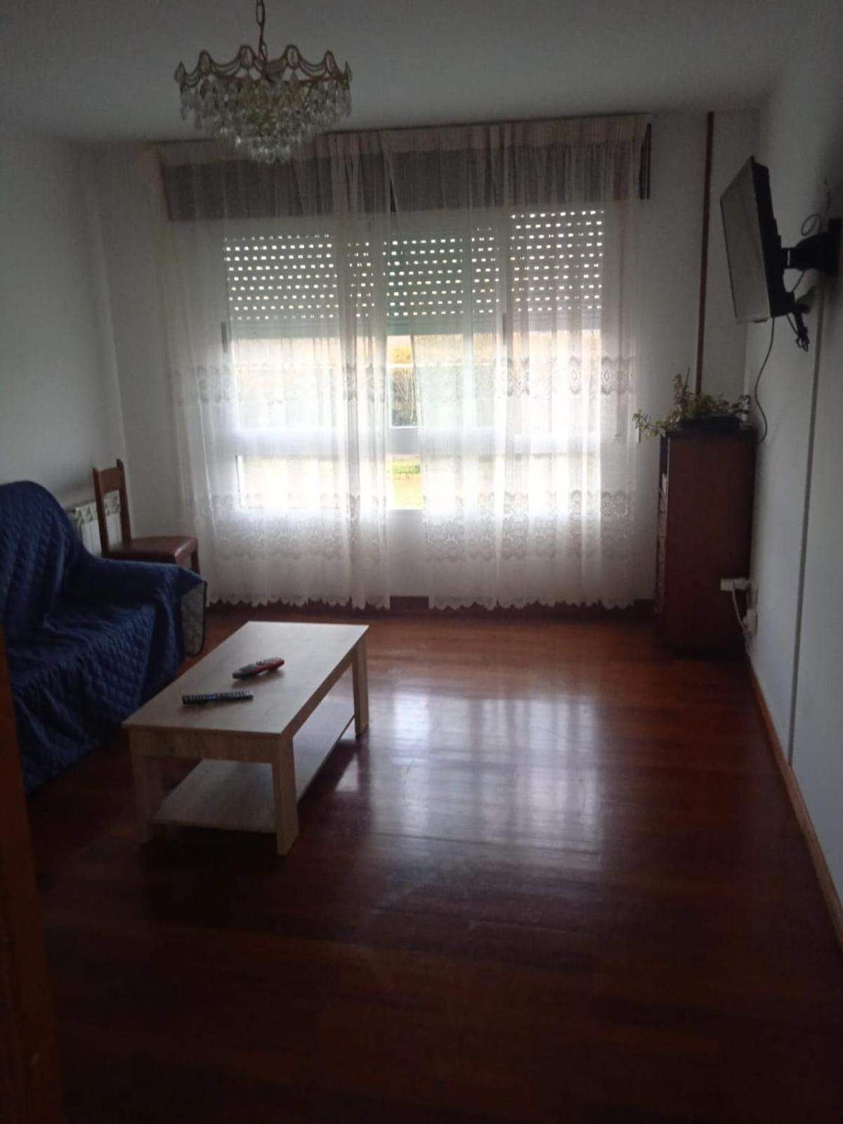 Three-Bedroom Apartment - Photo 11