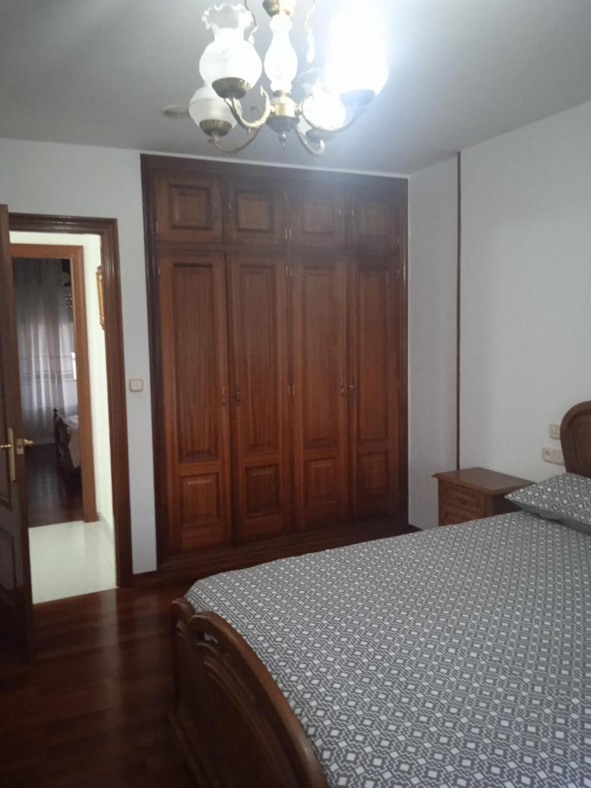 Three-Bedroom Apartment - Photo 12