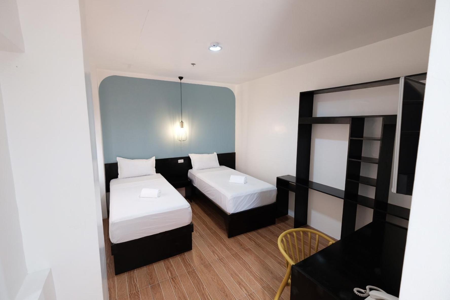 Twin Room - Photo 1
