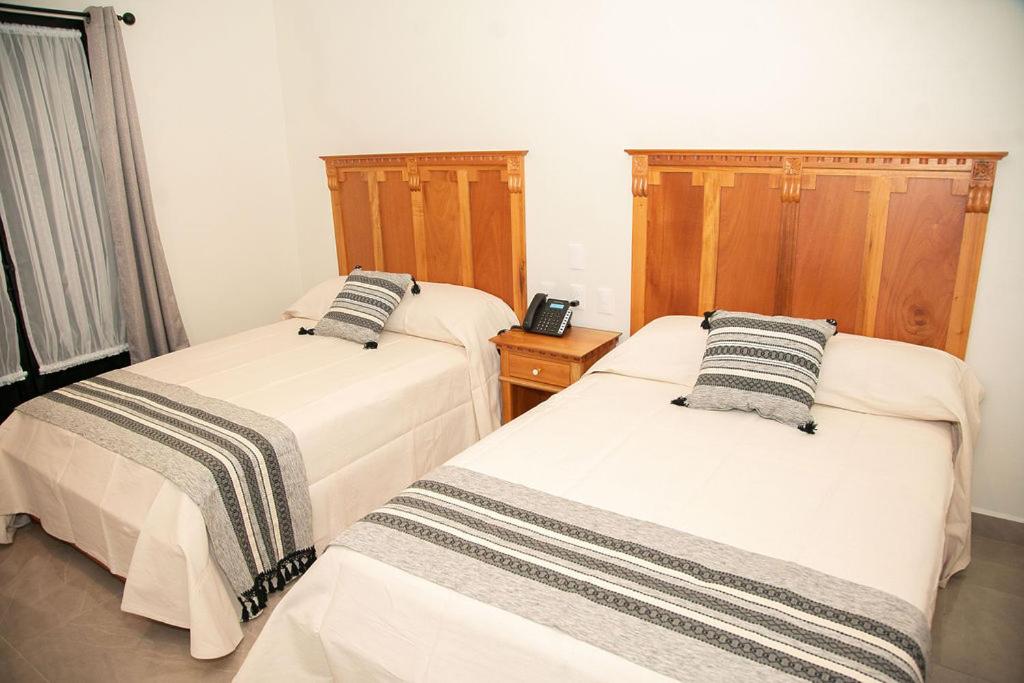 Deluxe Queen Room with Two Queen Beds - Photo 5