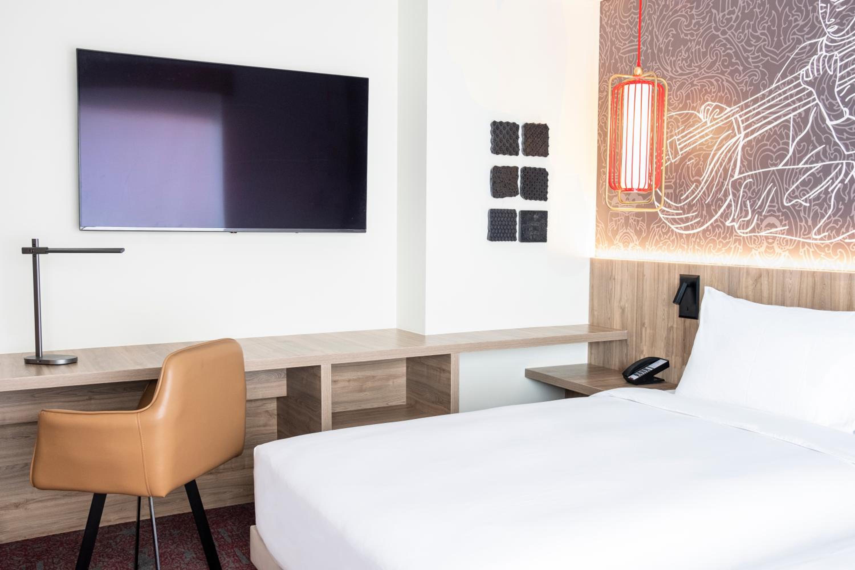 King Room with Sofa and City View, 15% disc on Food, Soft Beverages & Laundry