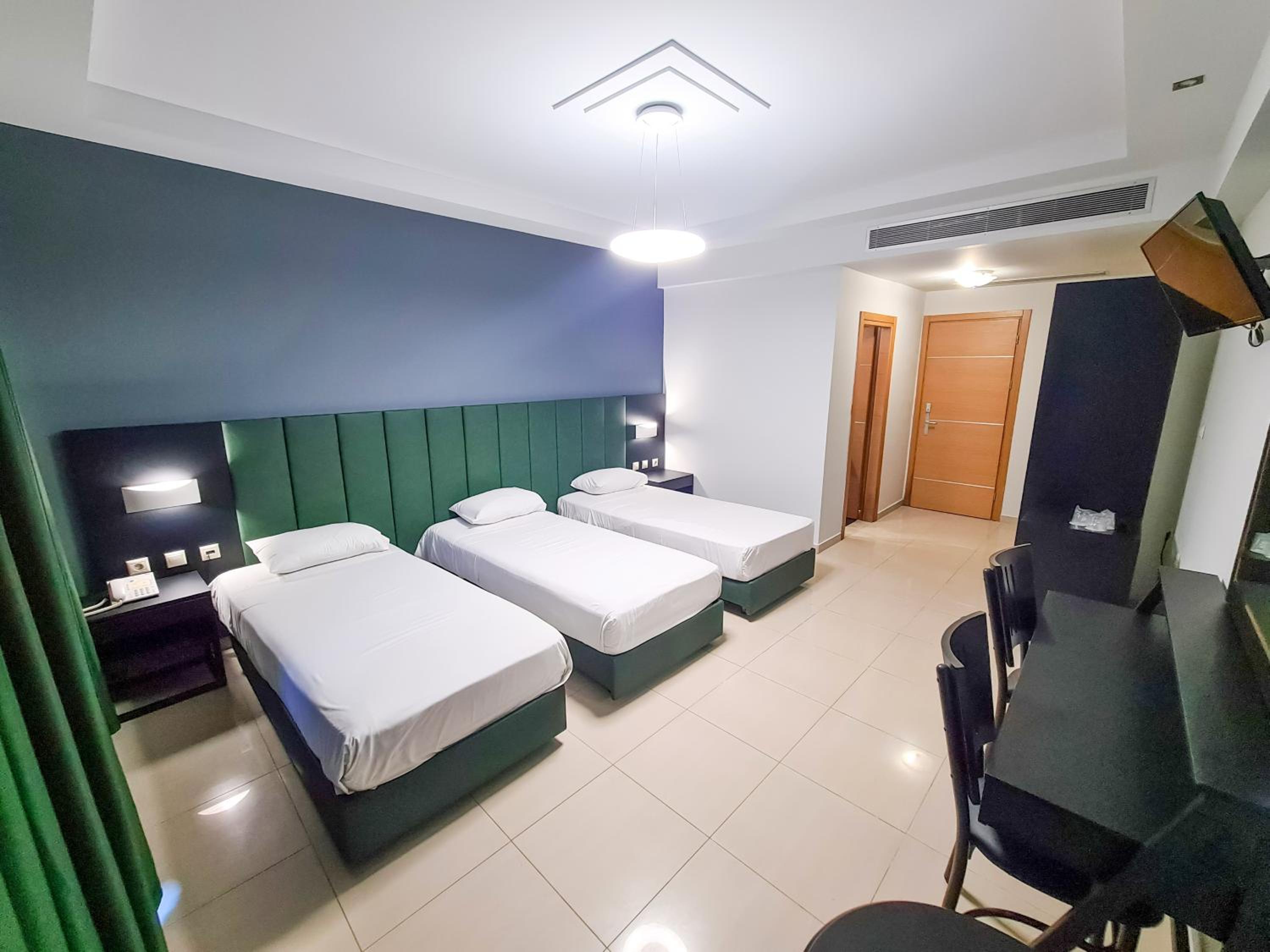 Triple Room - Photo 1