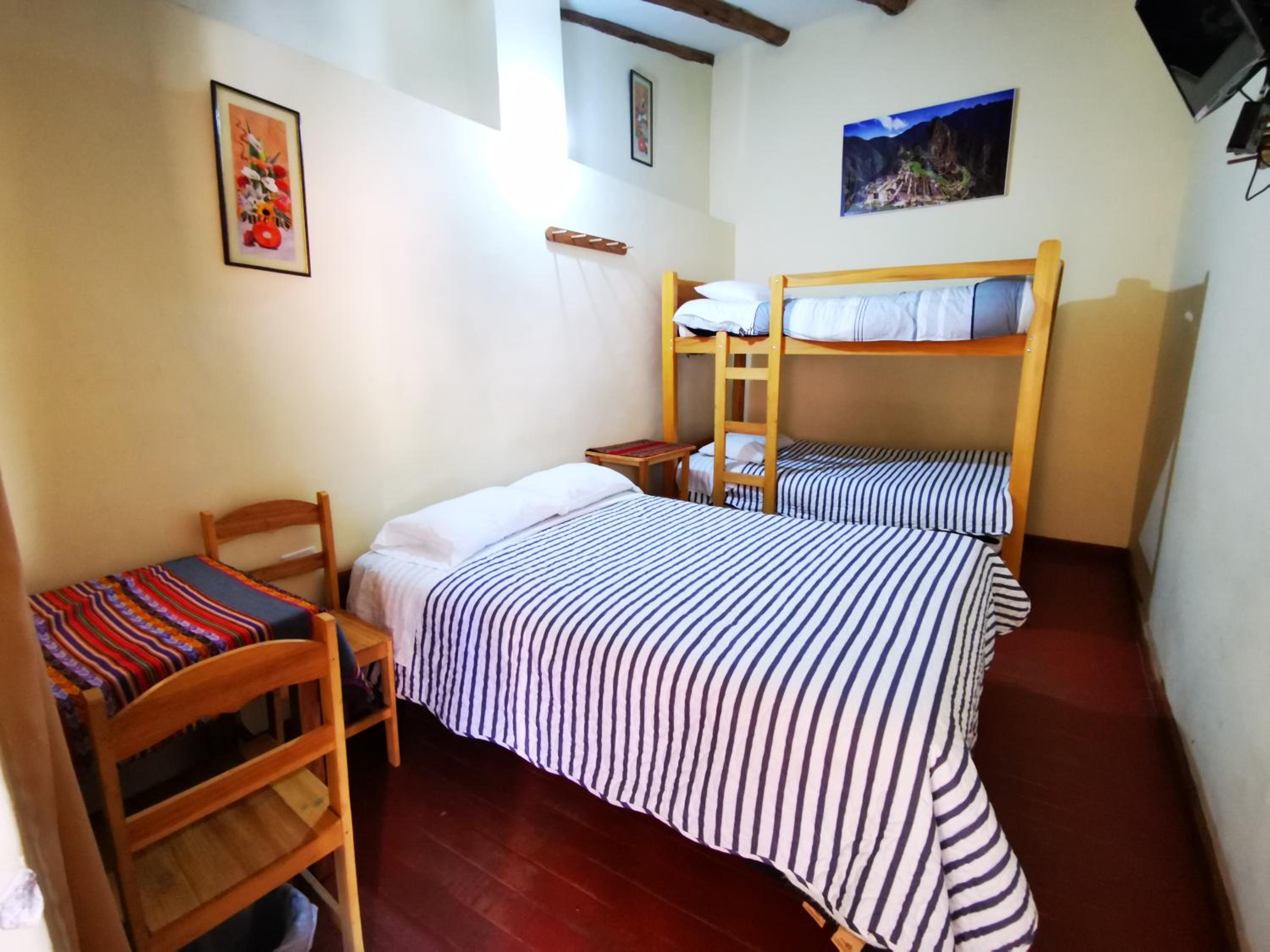 Economy Triple Room with Shared Bathroom photo 1