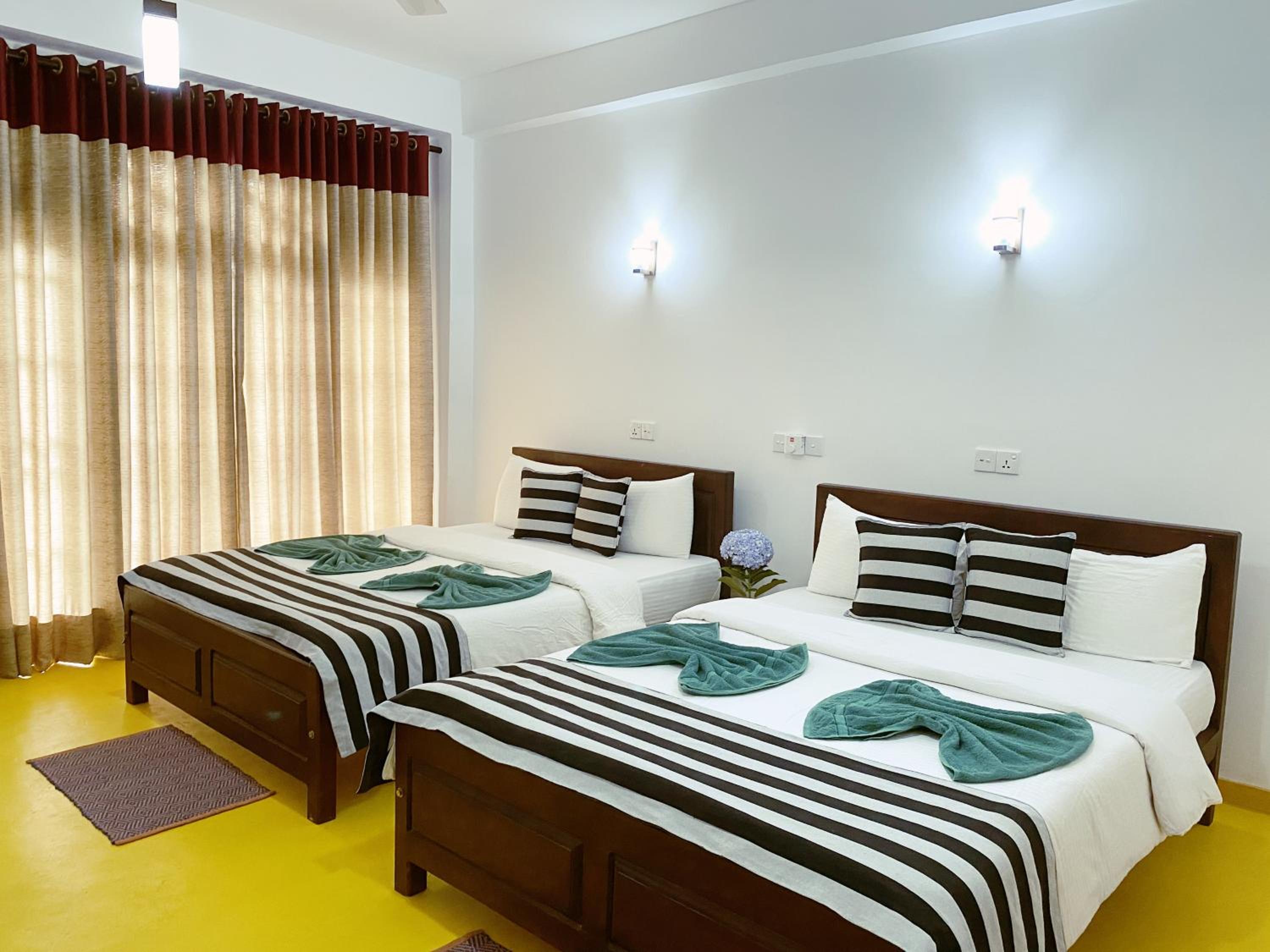 Deluxe Quadruple Room
