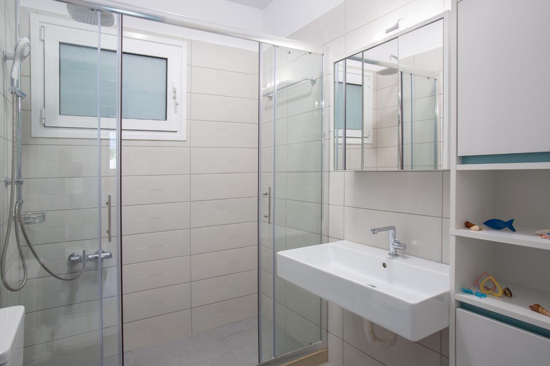 Three-Bedroom House - Photo 20