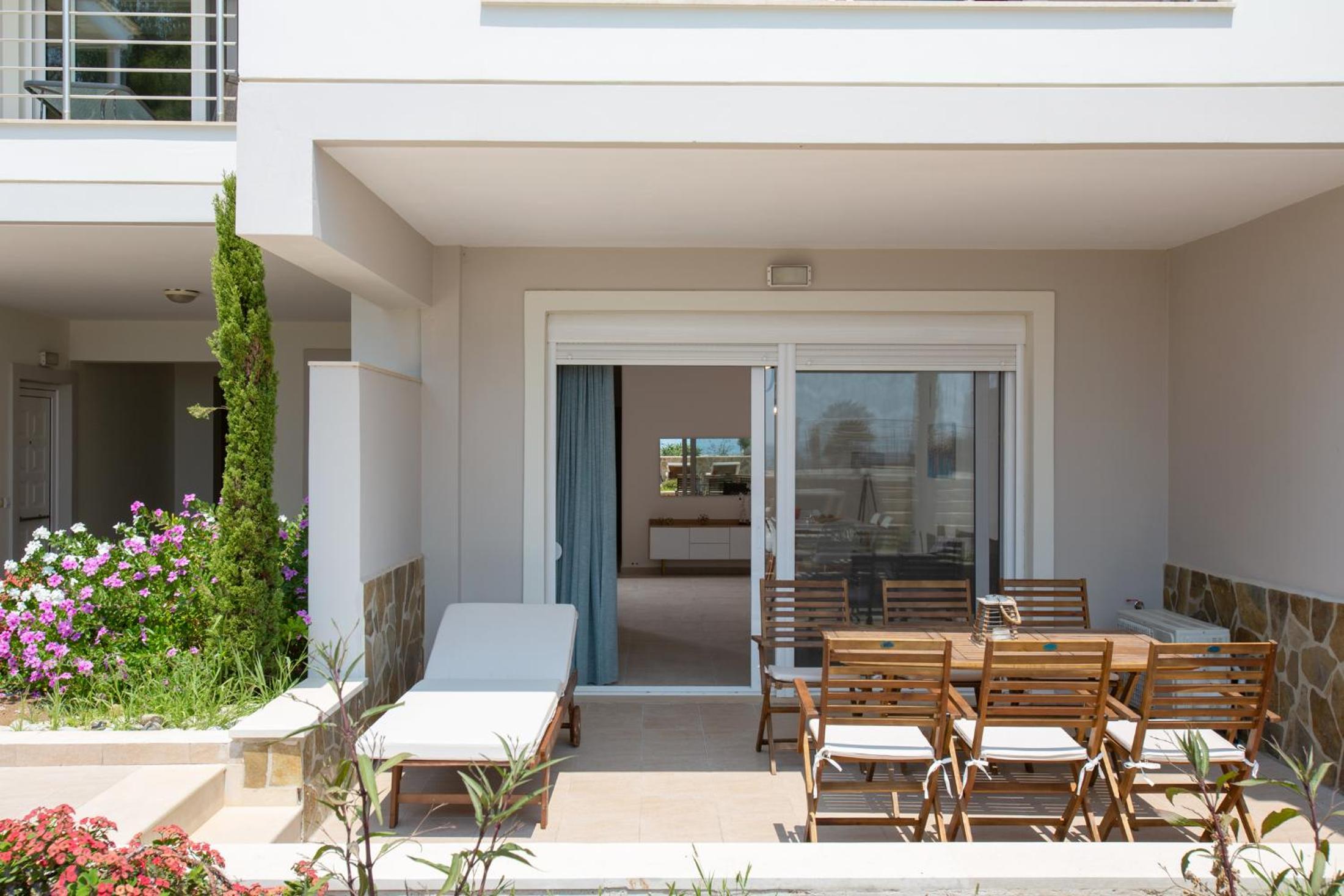 Three-Bedroom House - Photo 27