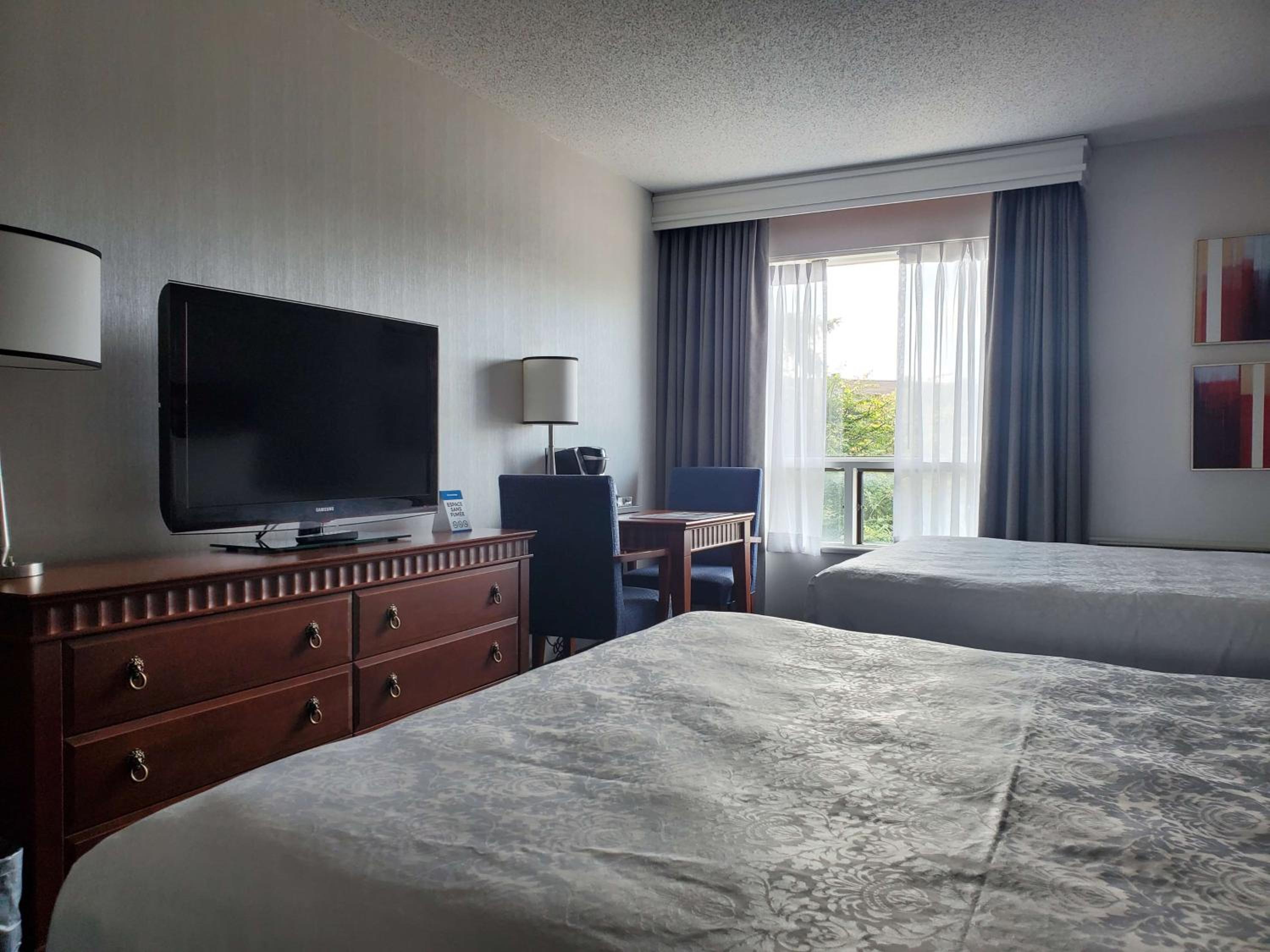 Queen Room with Two Queen Beds - Second Floor - Photo 1
