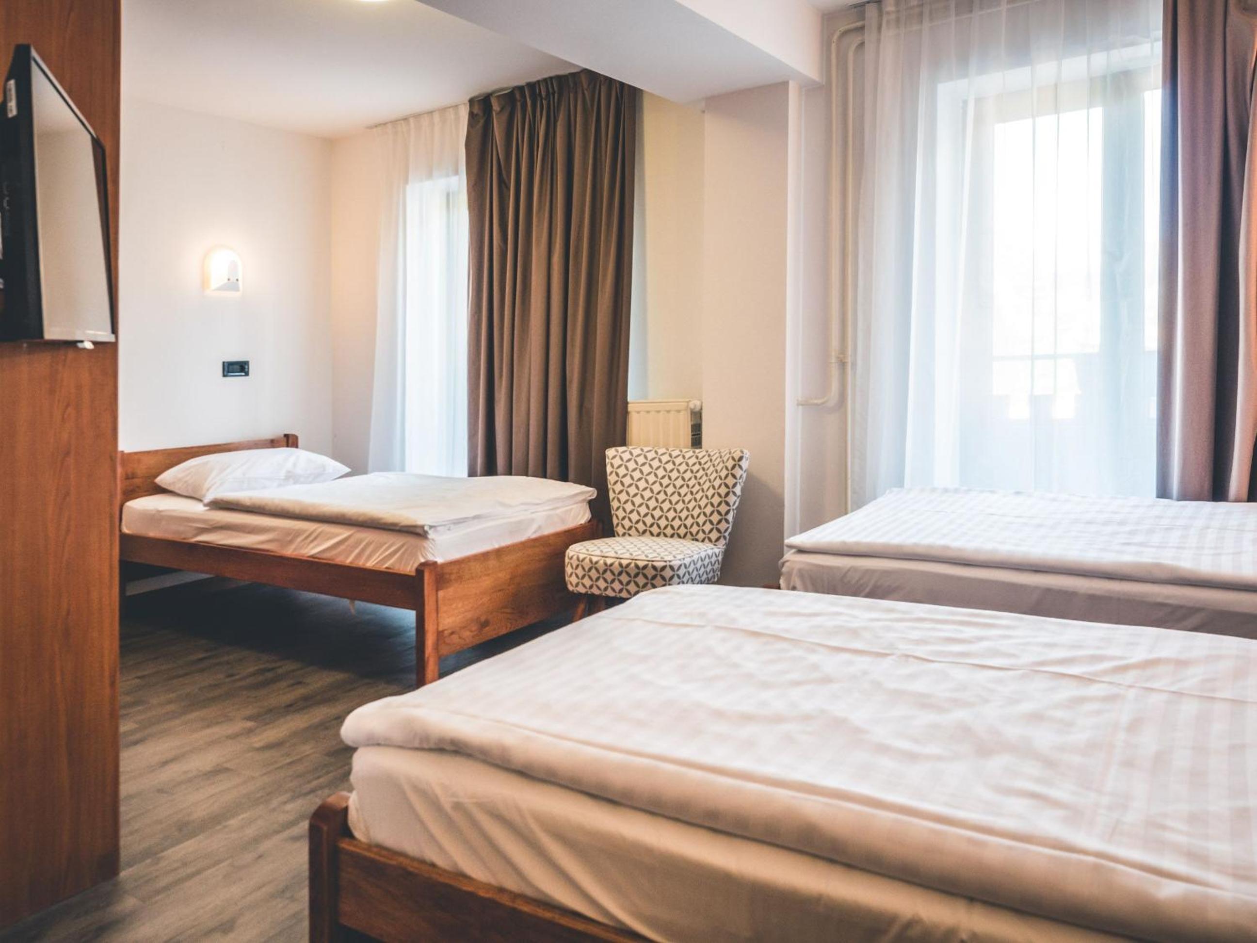 Triple Room - Photo 1