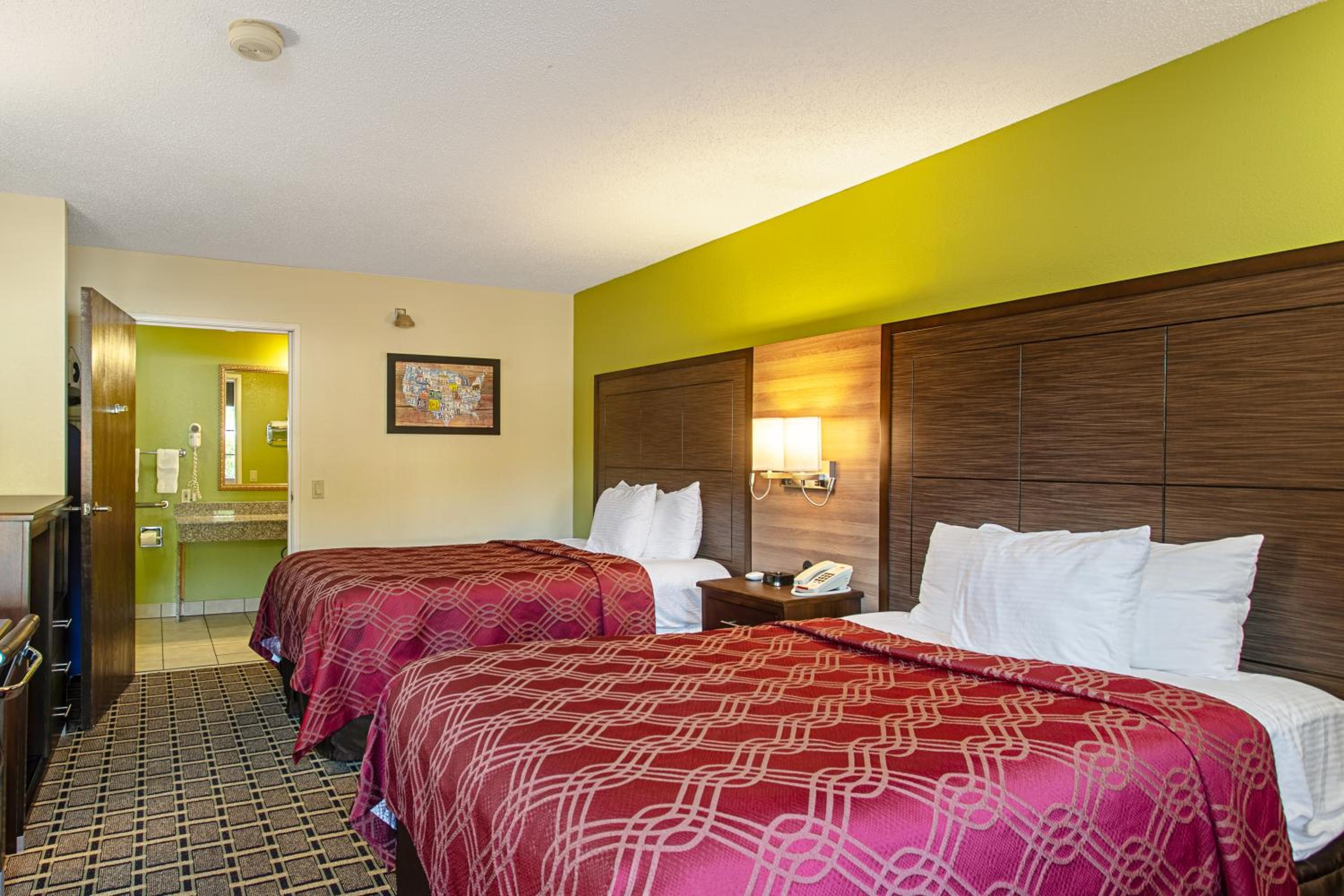Double Room with Two Double Beds - Accessible/Smoking - Photo 1