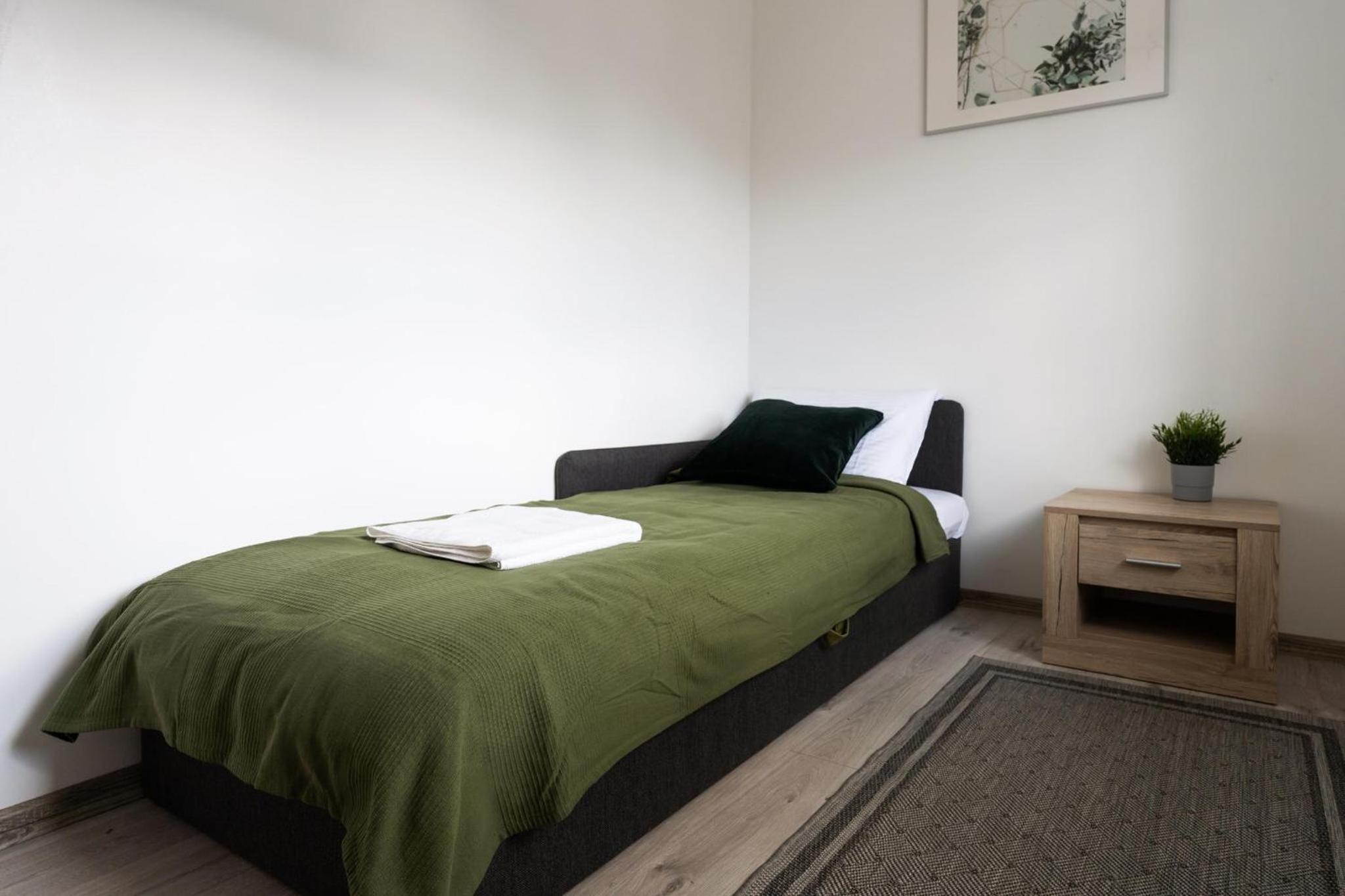 Three-Bedroom House - Photo 25