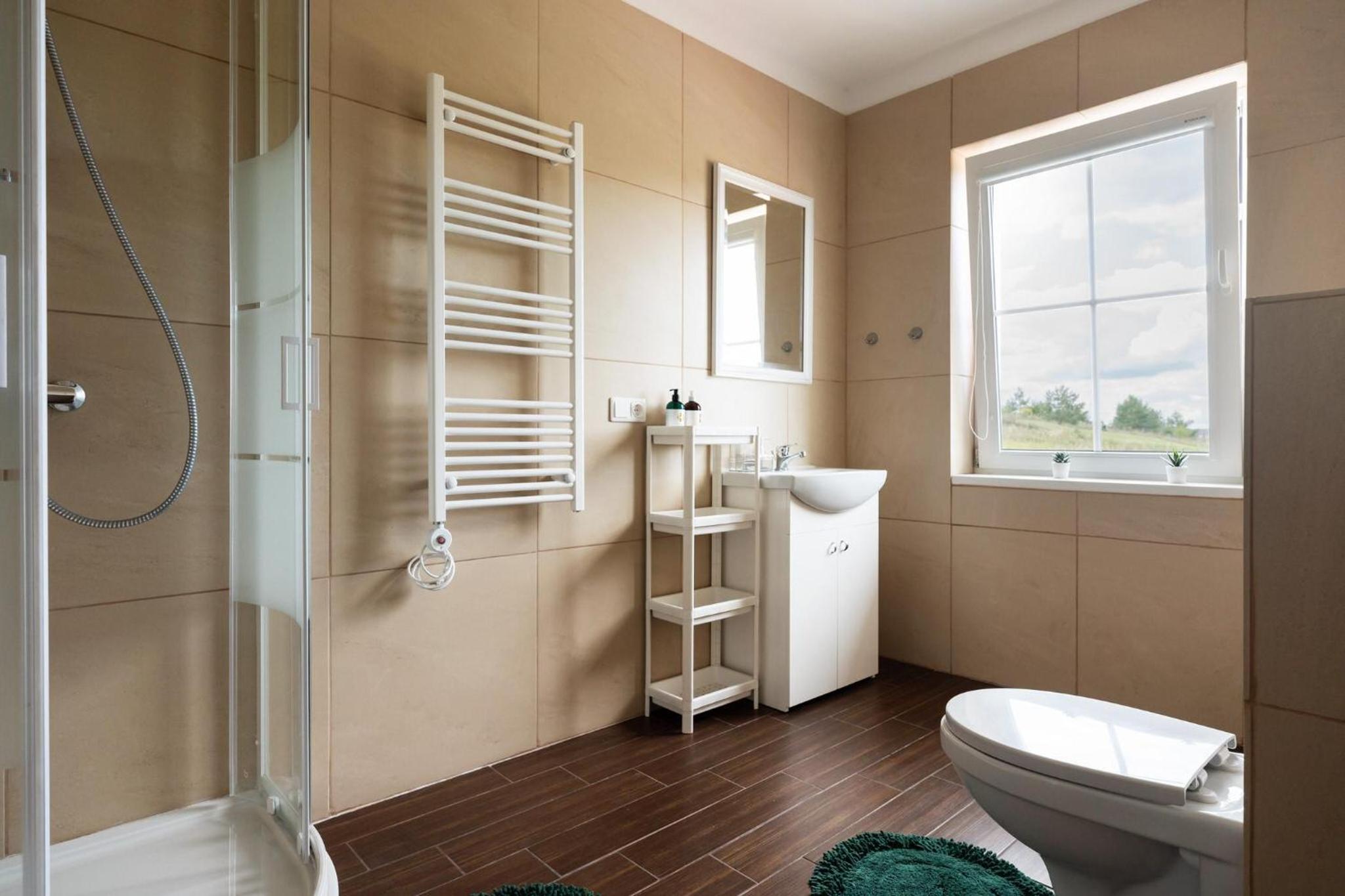 Three-Bedroom House - Photo 32