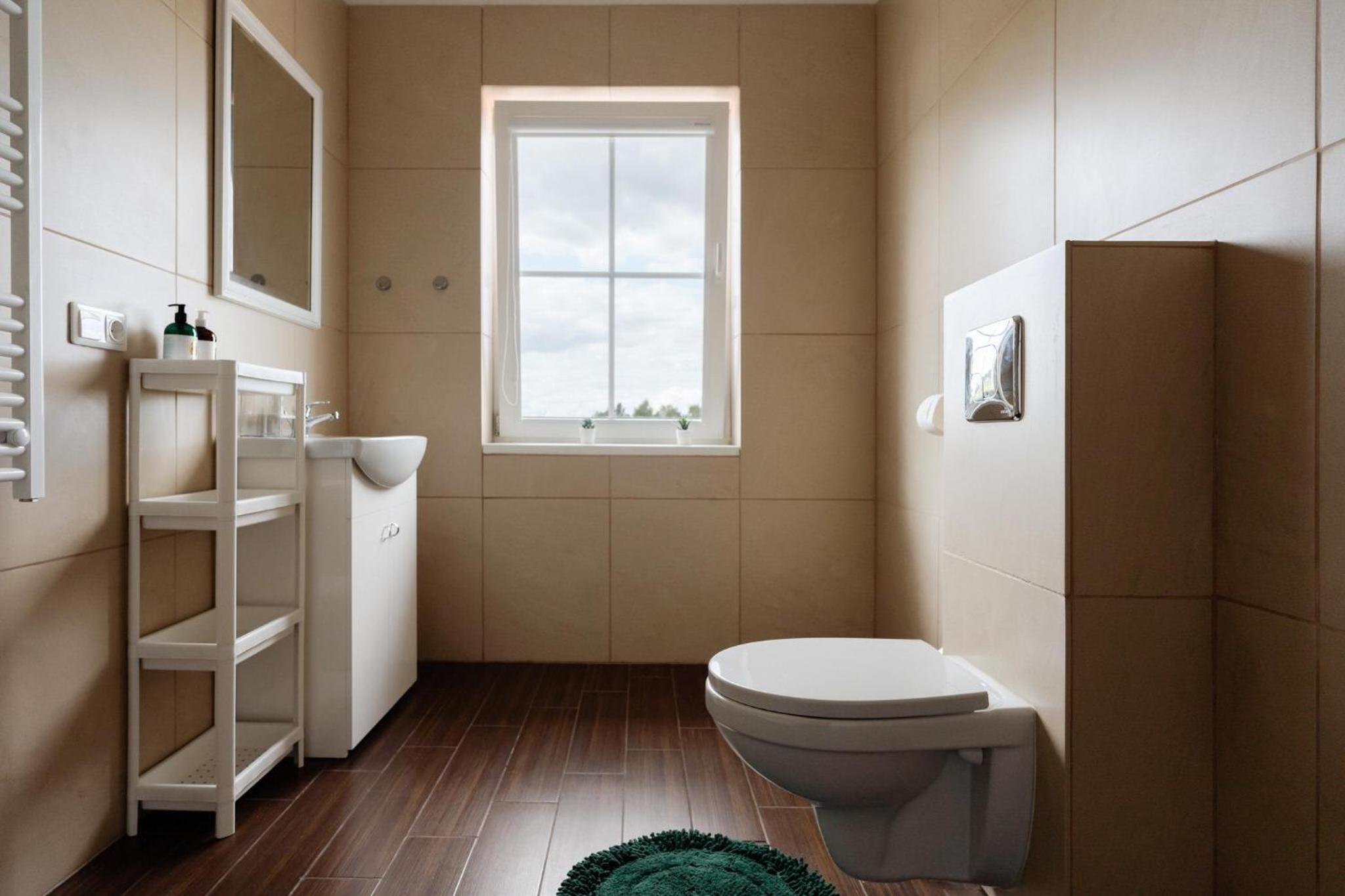 Three-Bedroom House - Photo 33