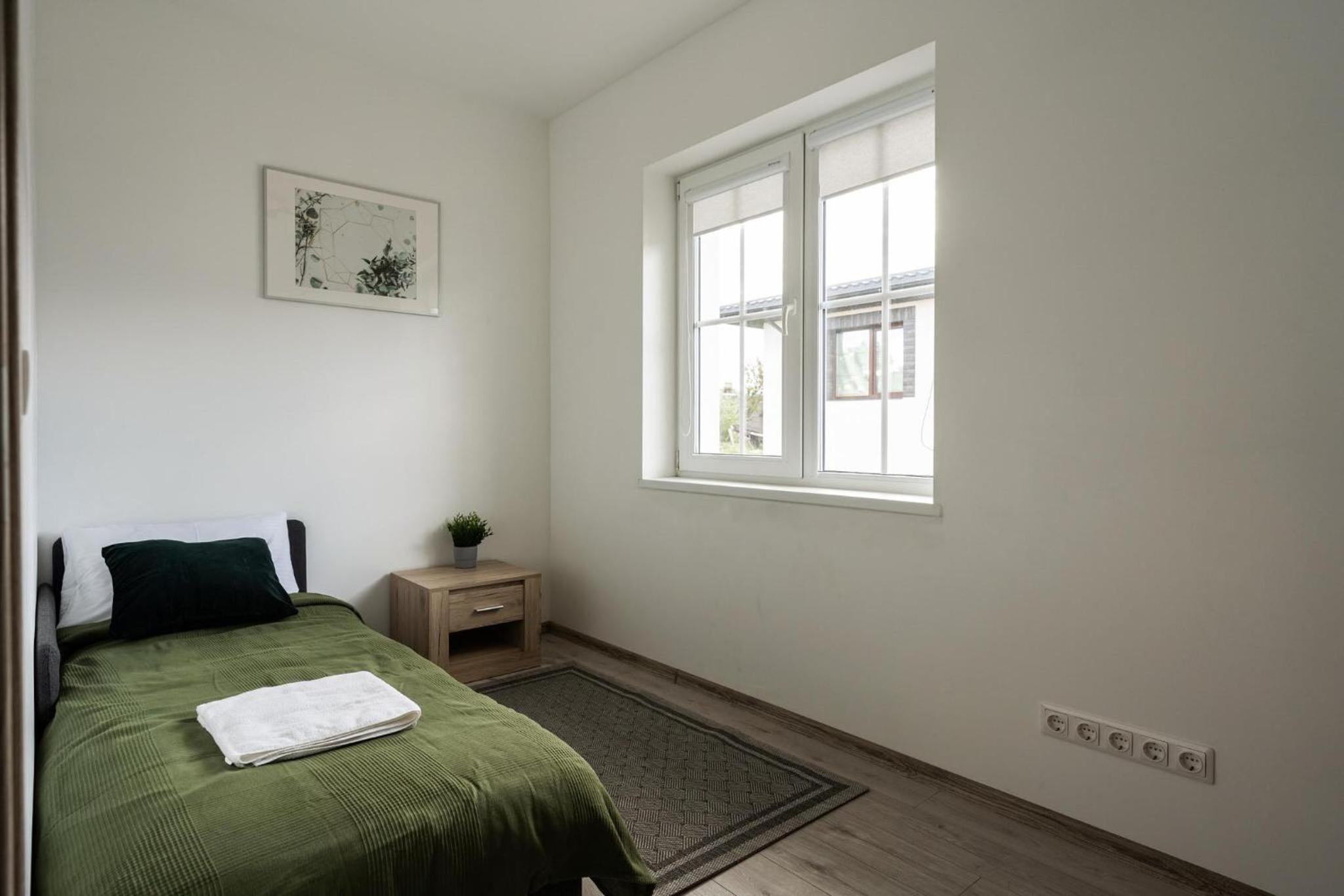 Three-Bedroom House - Photo 26