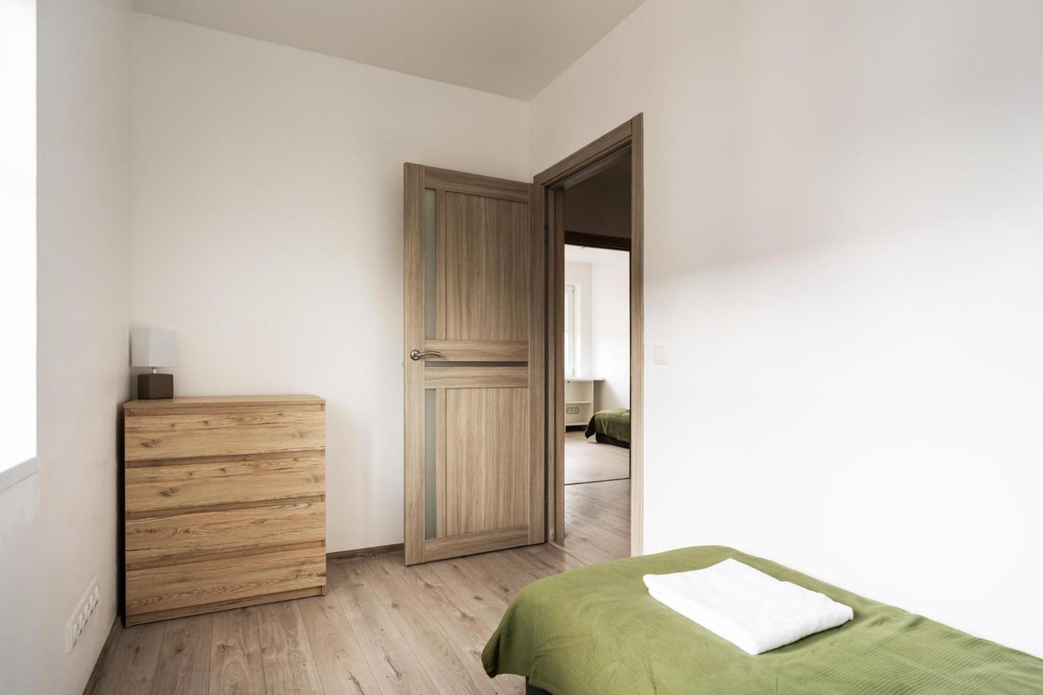 Three-Bedroom House - Photo 31