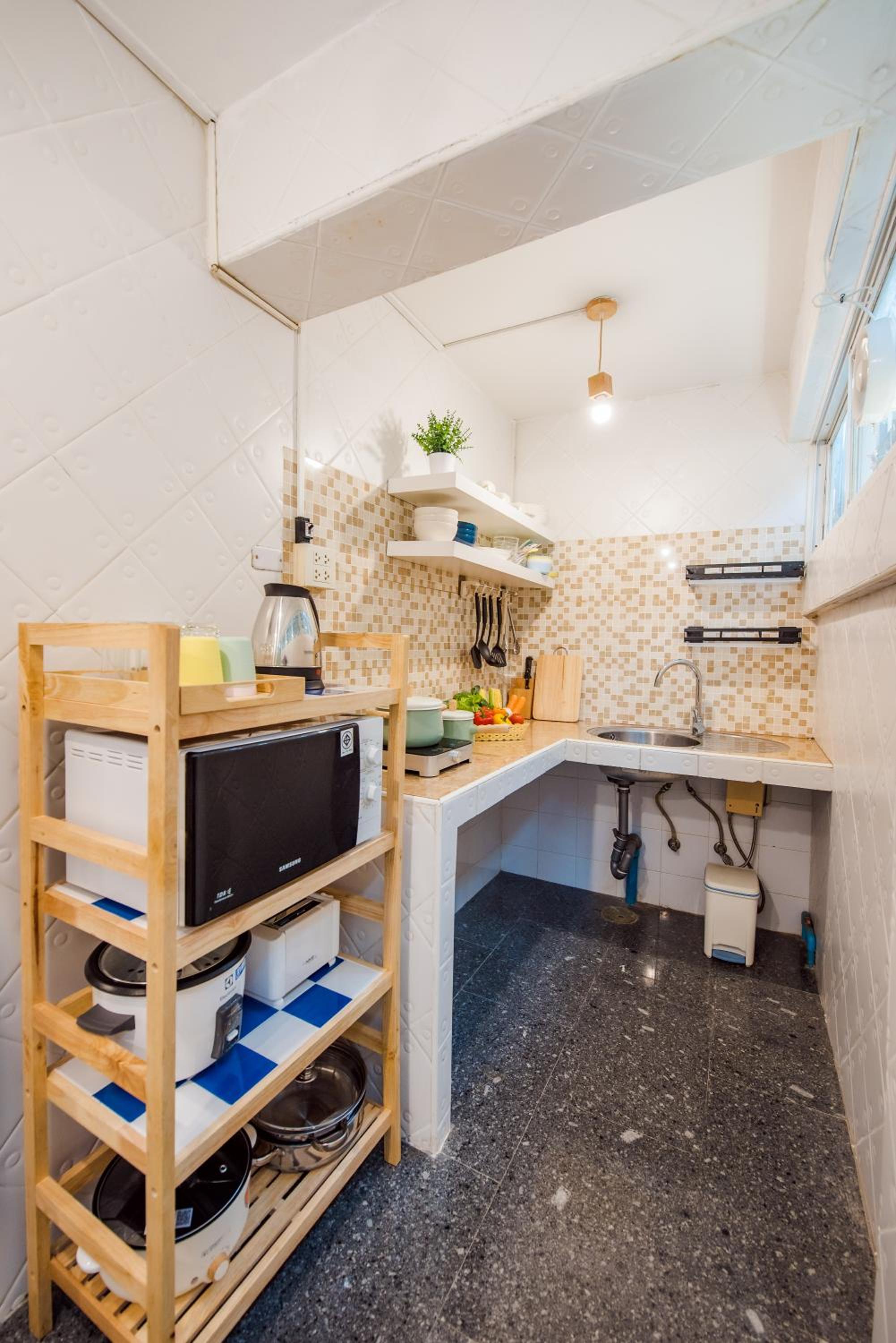 Three-Bedroom House - Photo 46