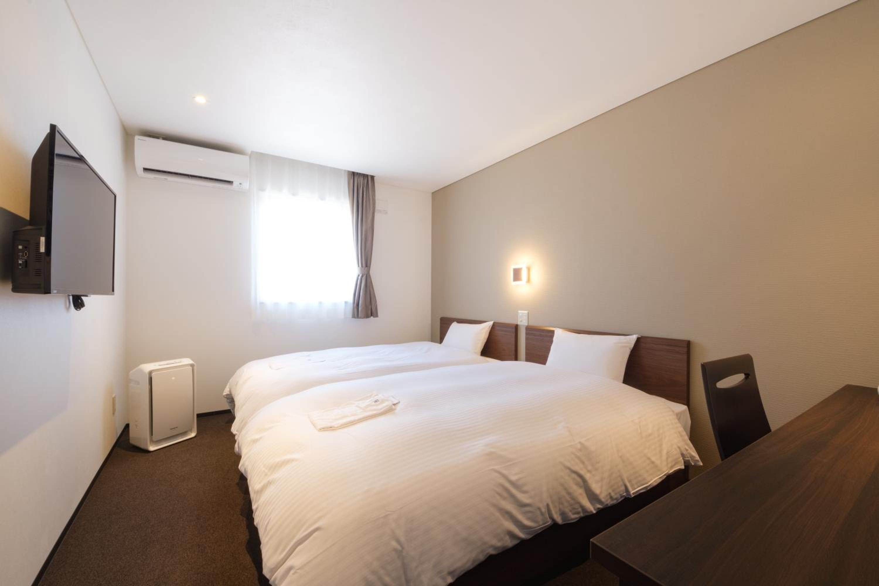 Twin Room - Photo 1