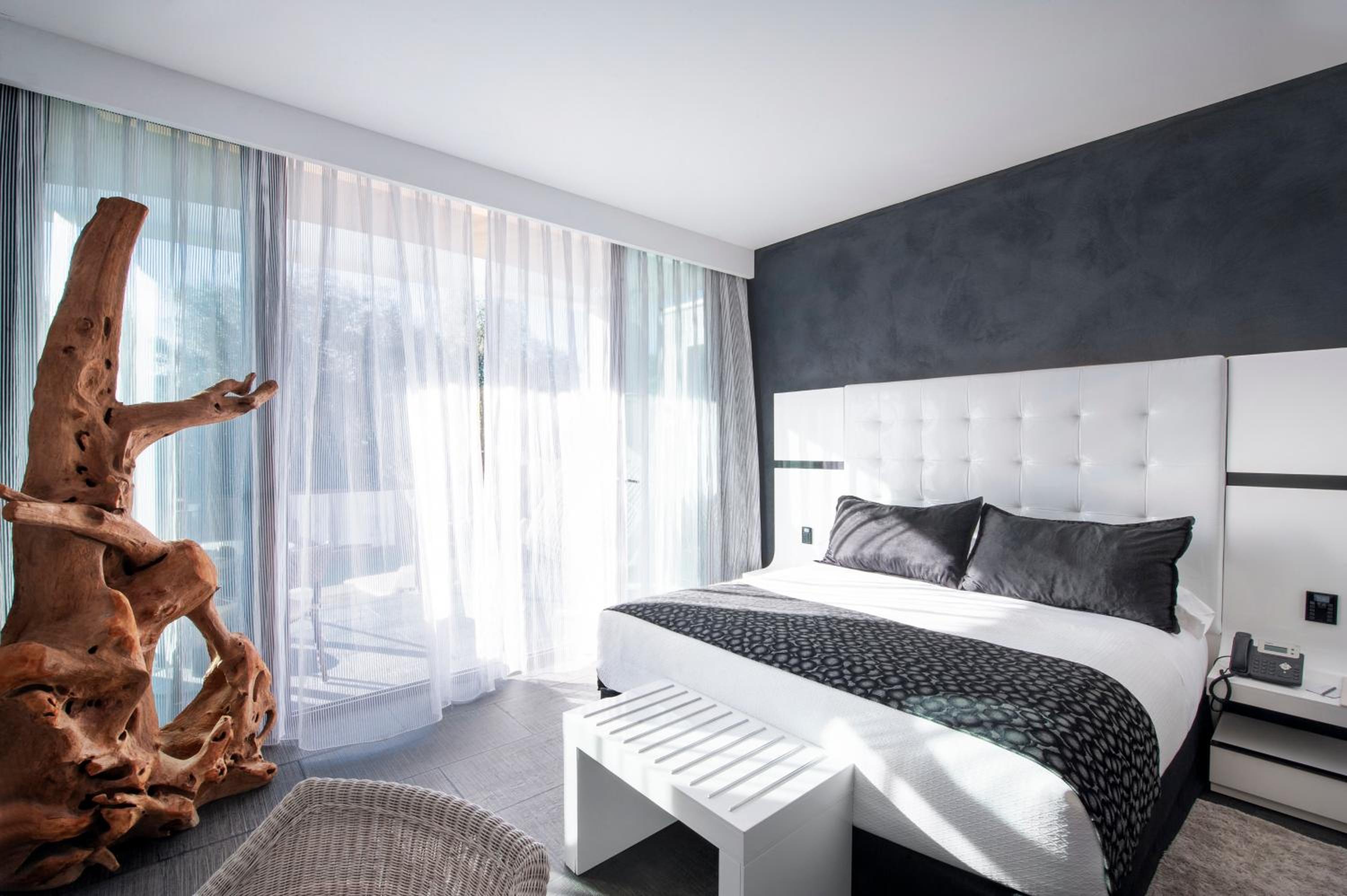 Suite con Jacuzzi® y Jardín Privado